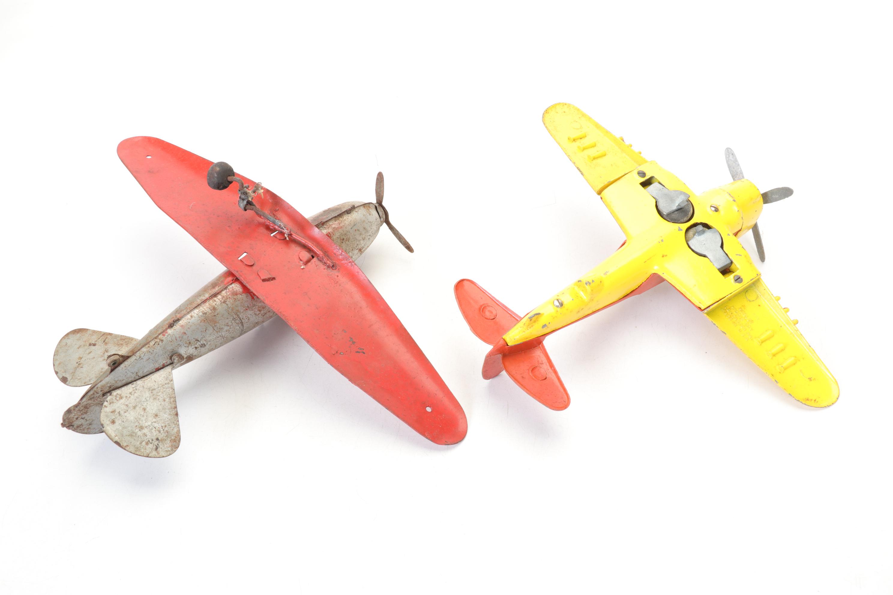 Wyandotte Pair of Pressed Steel Detroit Aircraft Models with Other Tin Planes