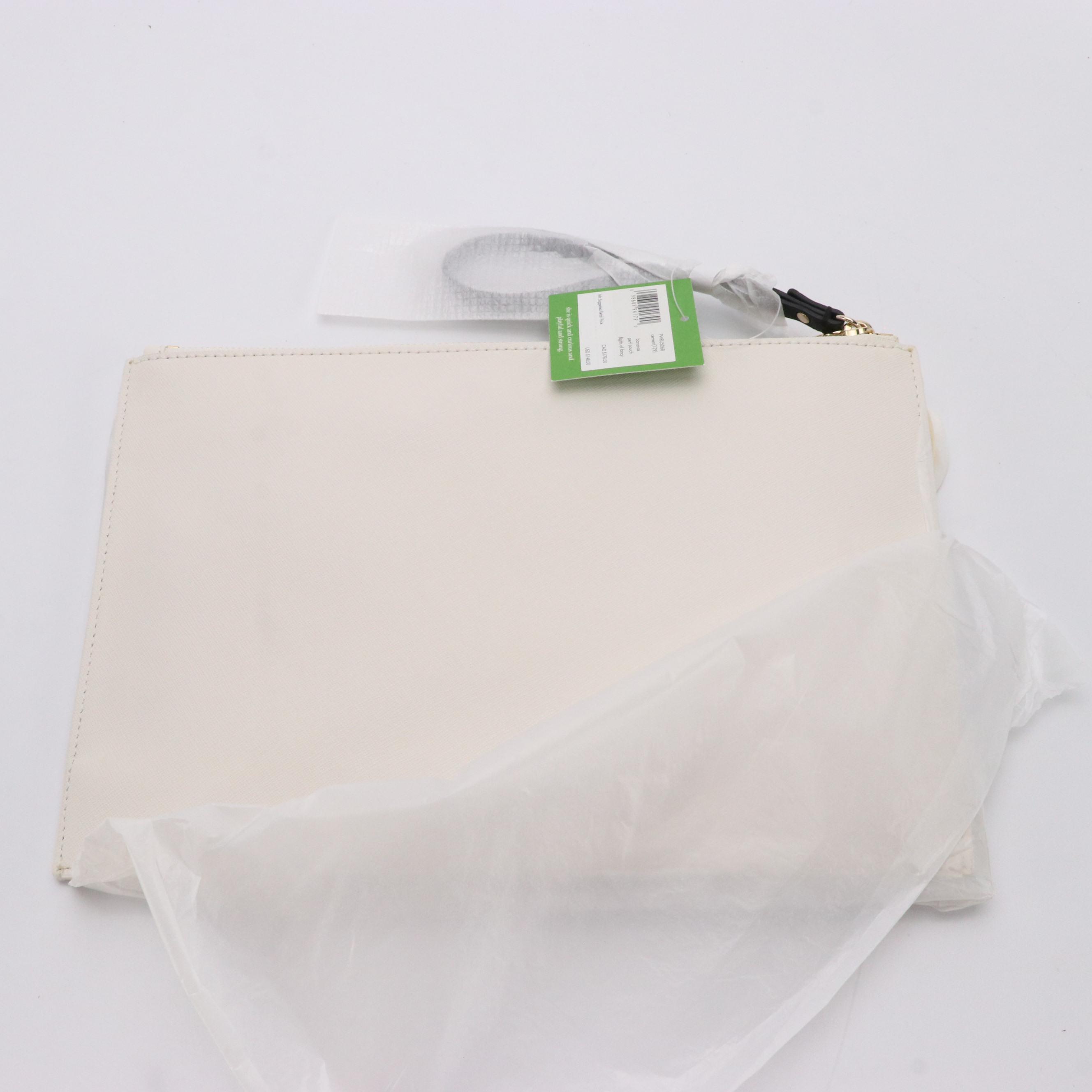 Kate Spade Bananas Perforated Wristlet and The Journal Newspaper Clutch w/ Tags