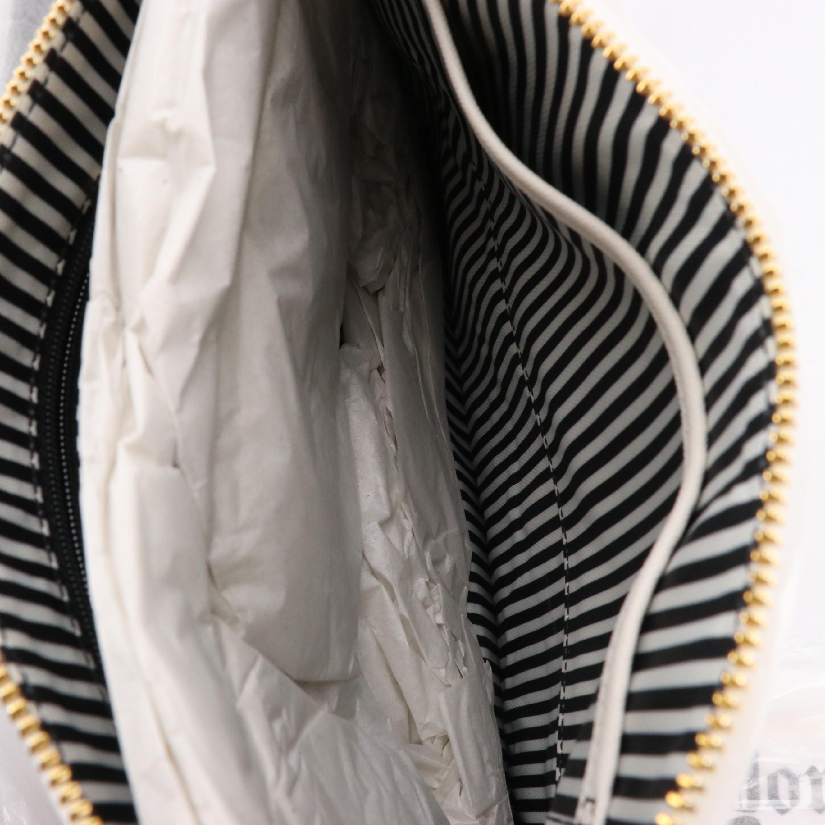 Kate Spade Bananas Perforated Wristlet and The Journal Newspaper Clutch w/ Tags