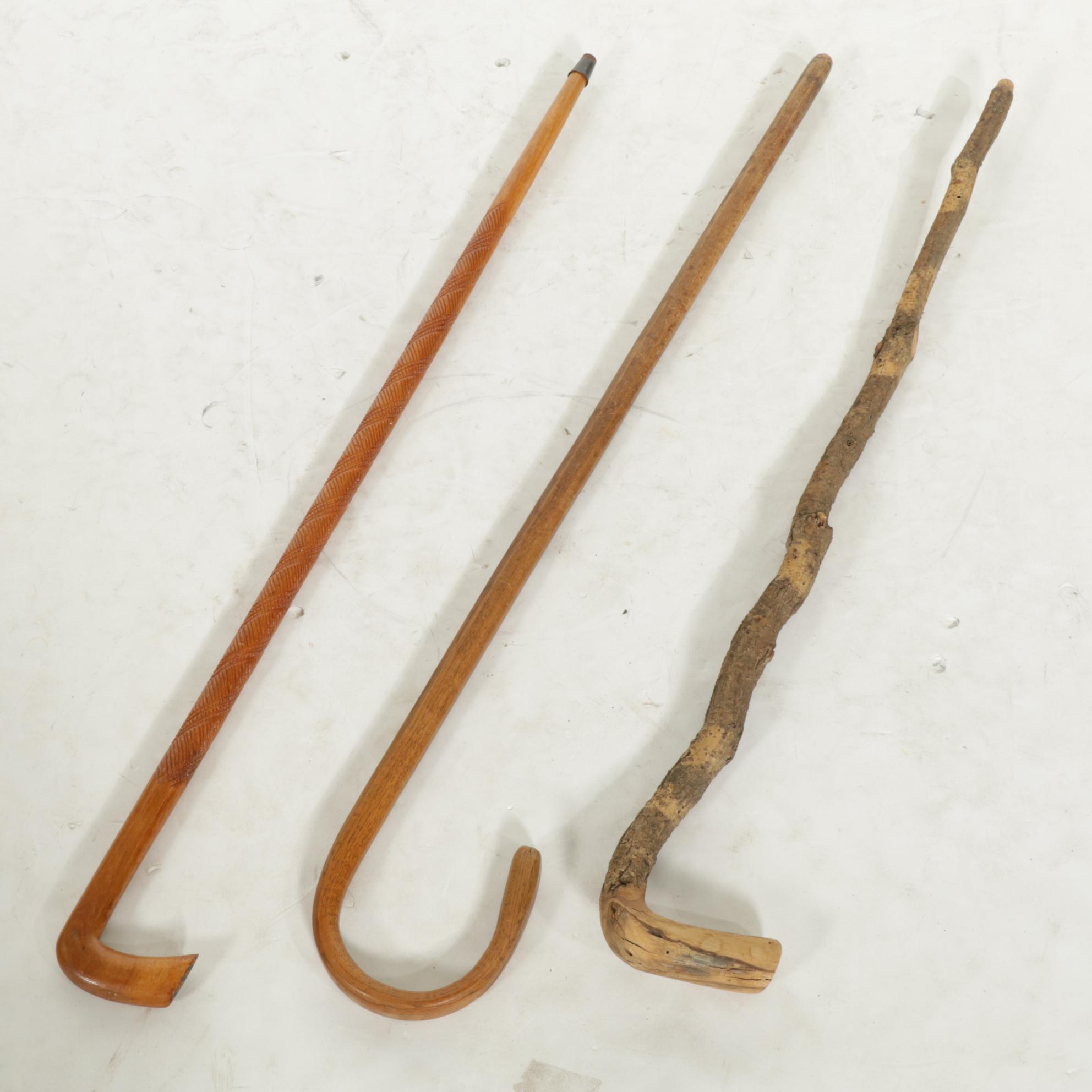 Walnut Shepherd's Hook Cane with Two Other Wood Canes