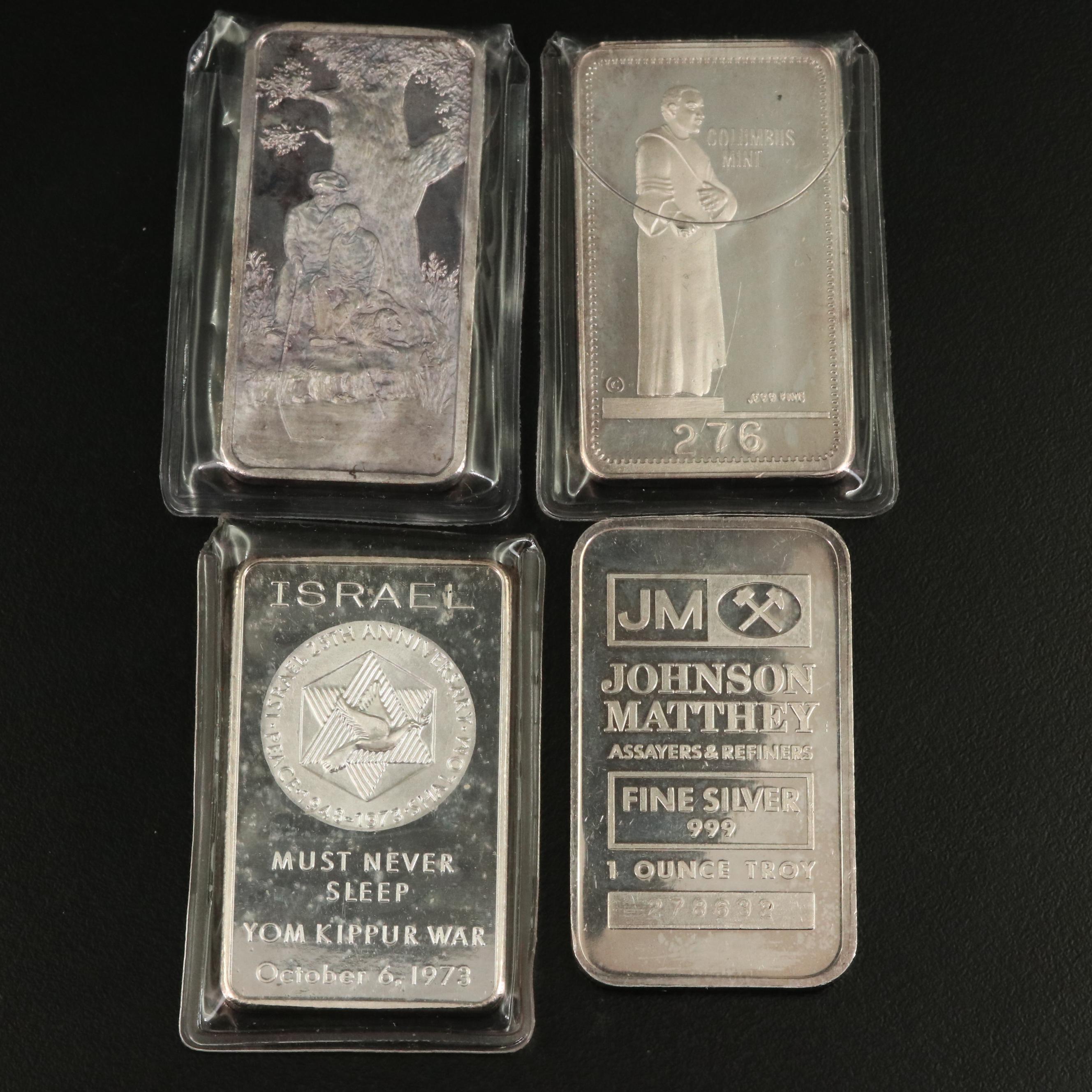 Six One Ounce Silver Bars and a Silver Round