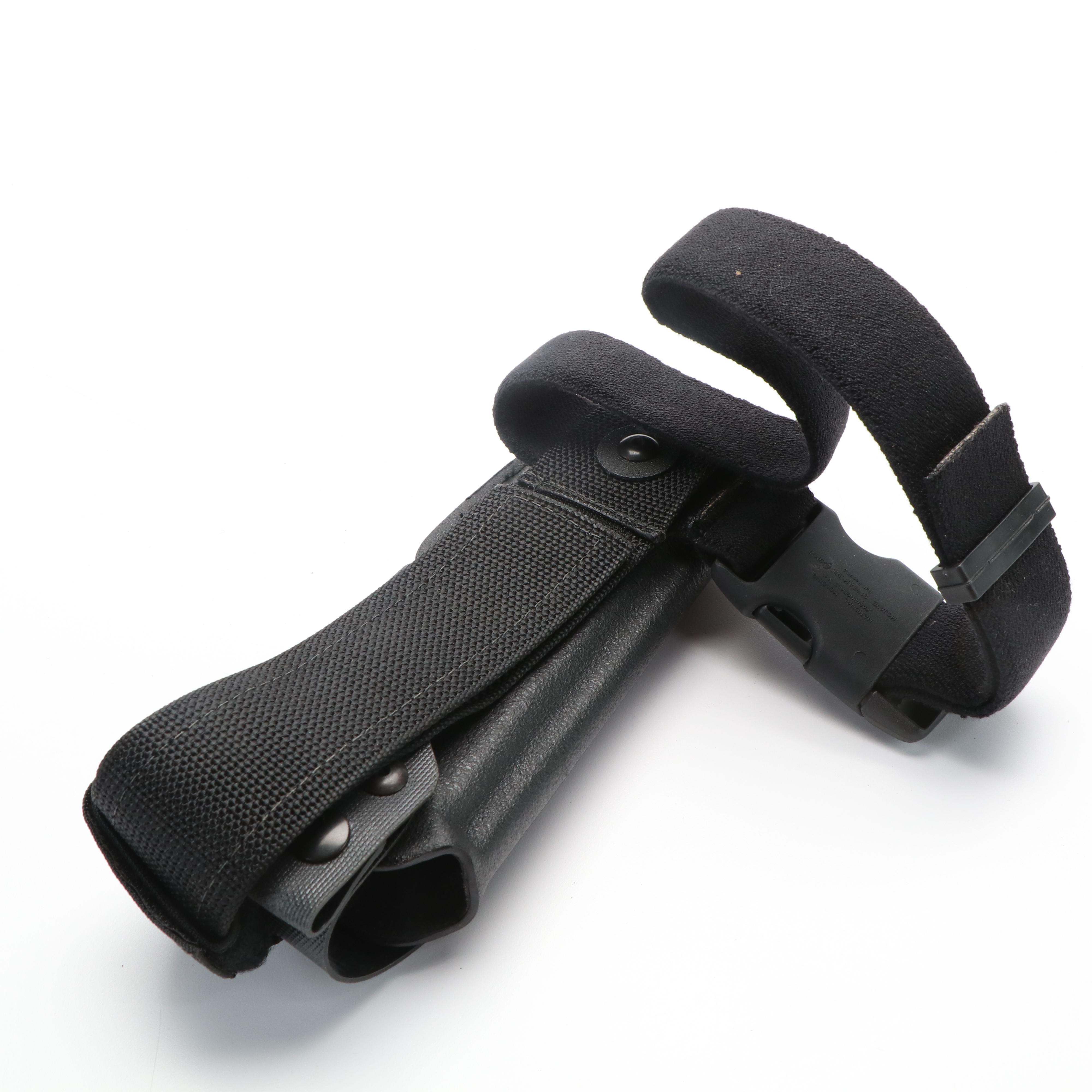 Safariland Gun Holsters with Mag Pouch, Handcuff Case, and More