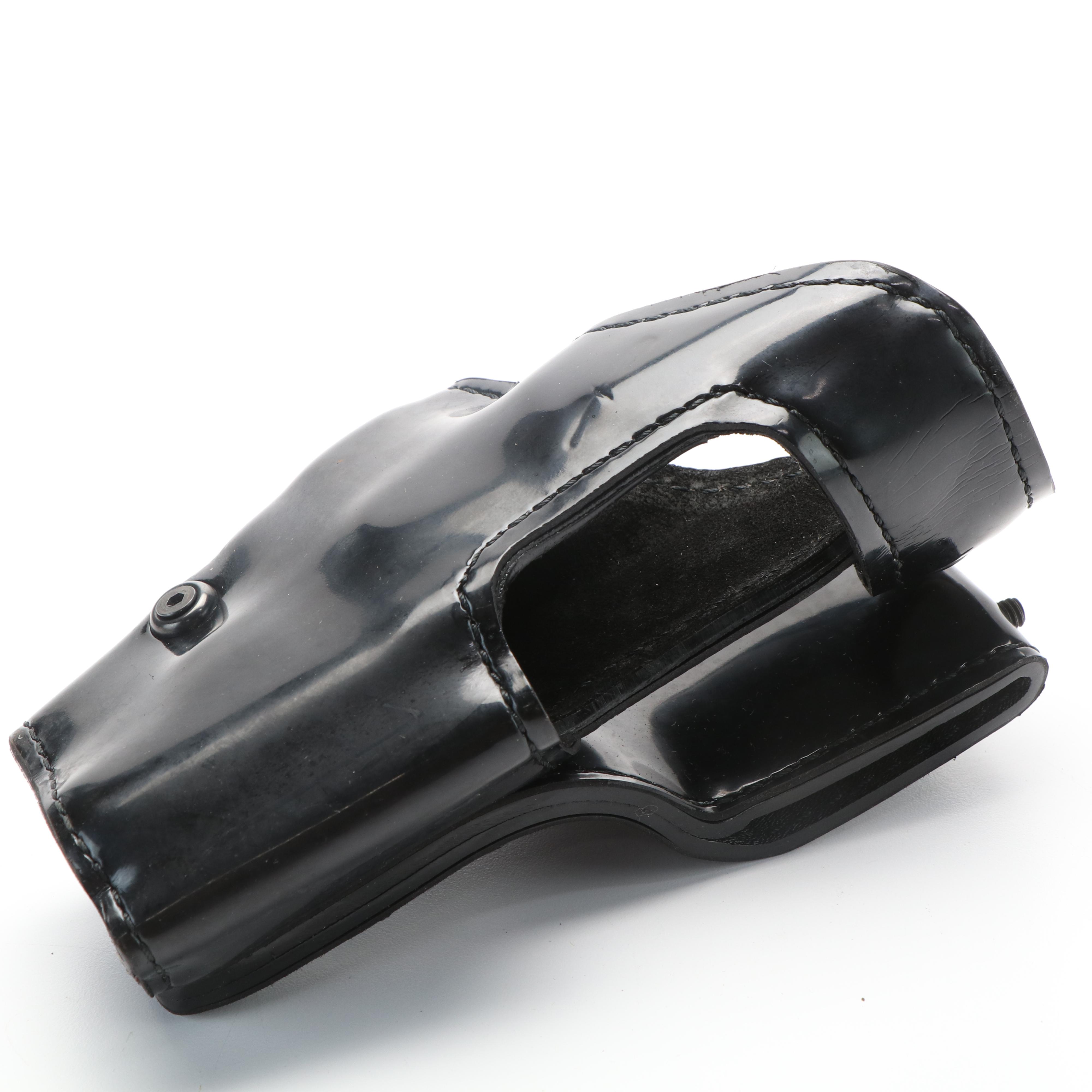 Safariland Gun Holsters with Mag Pouch, Handcuff Case, and More