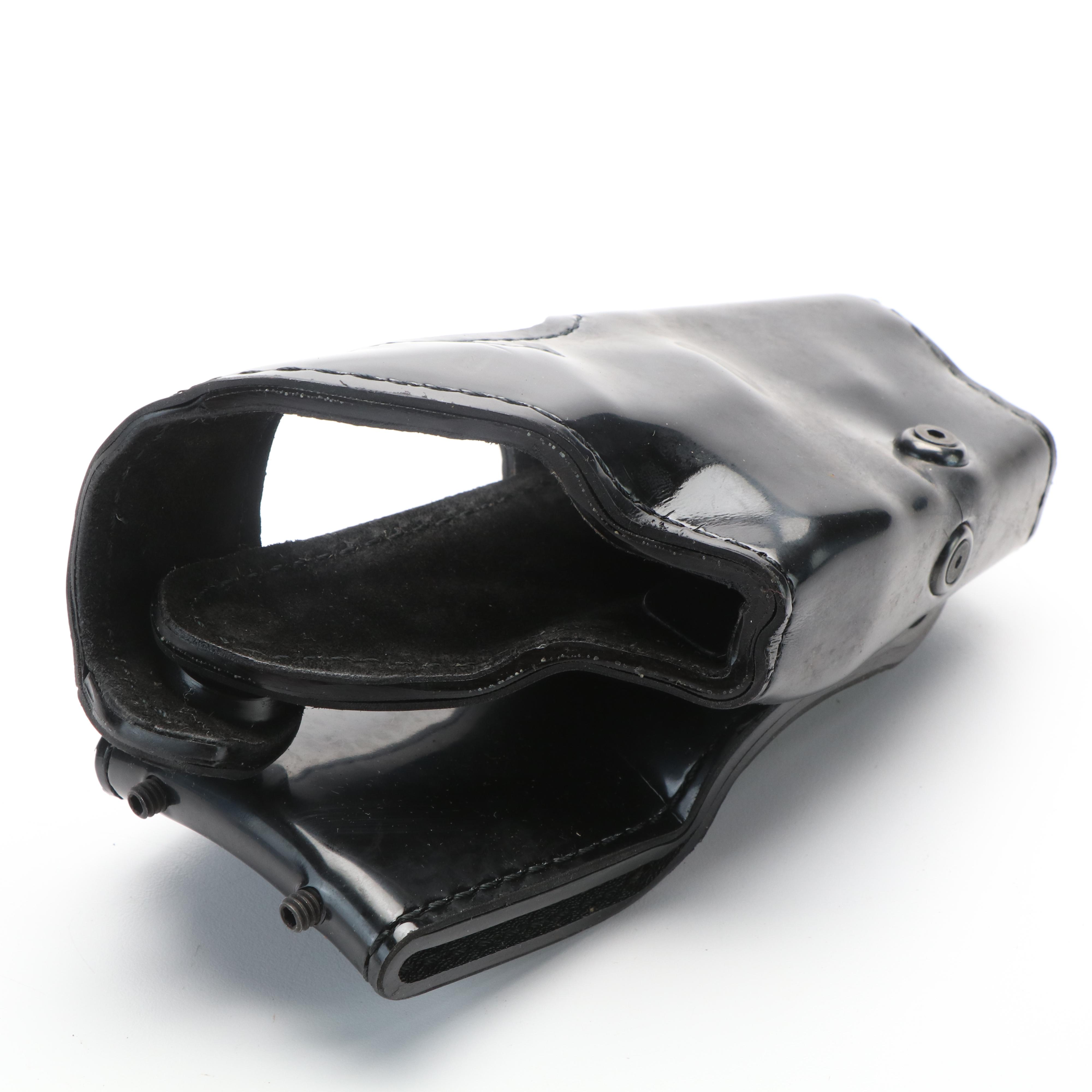 Safariland Gun Holsters with Mag Pouch, Handcuff Case, and More