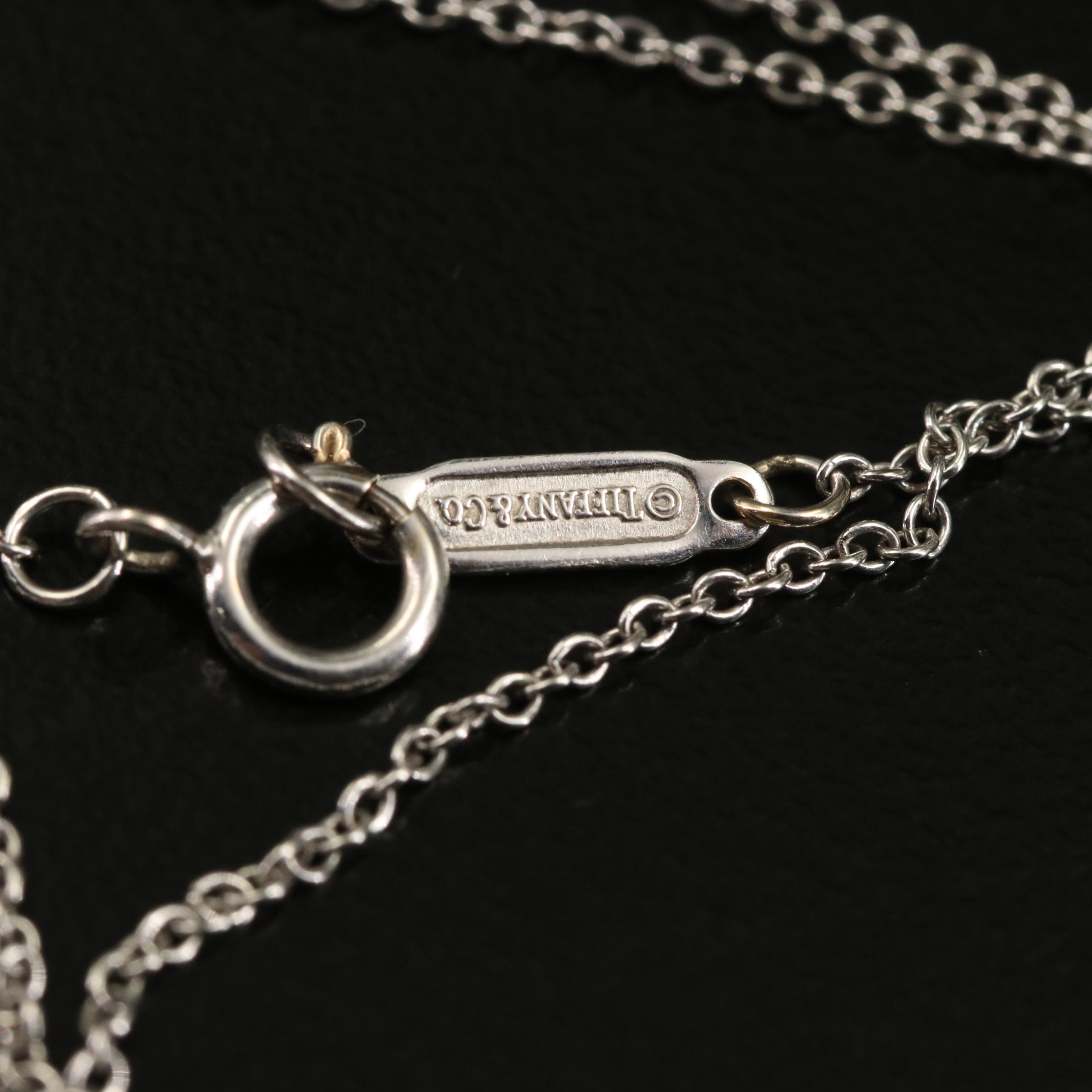 Tiffany & Co. 18K Diamond Peace Symbol Pendant Necklace