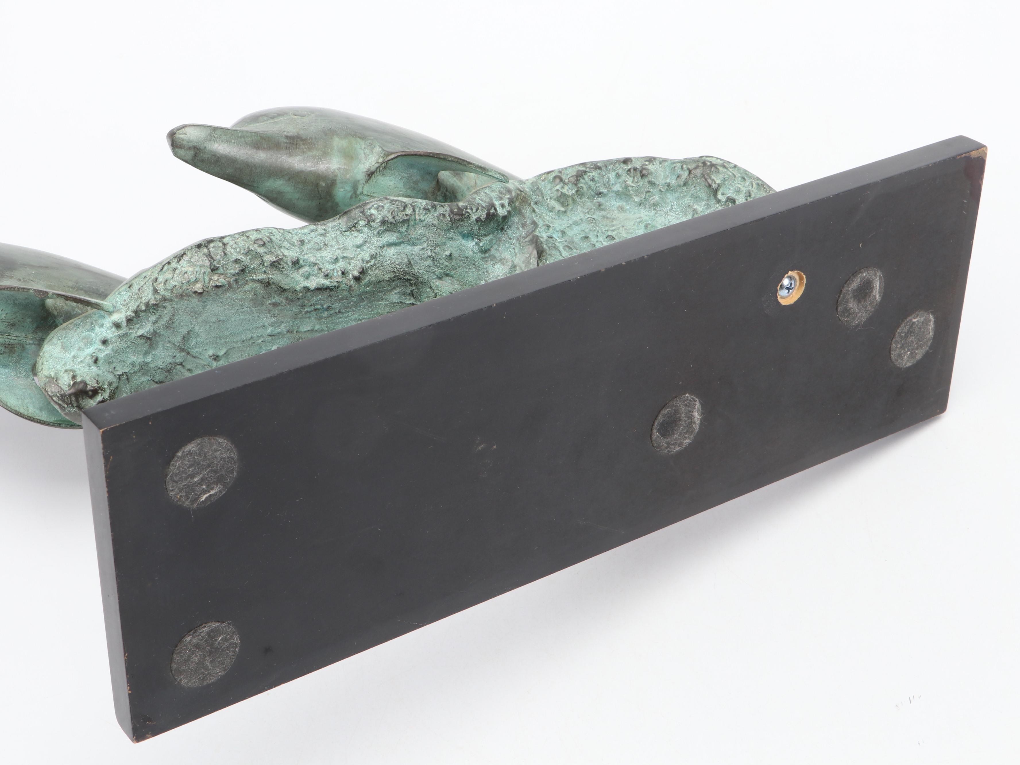 San Pacific International Metal Dolphins on Wood Base