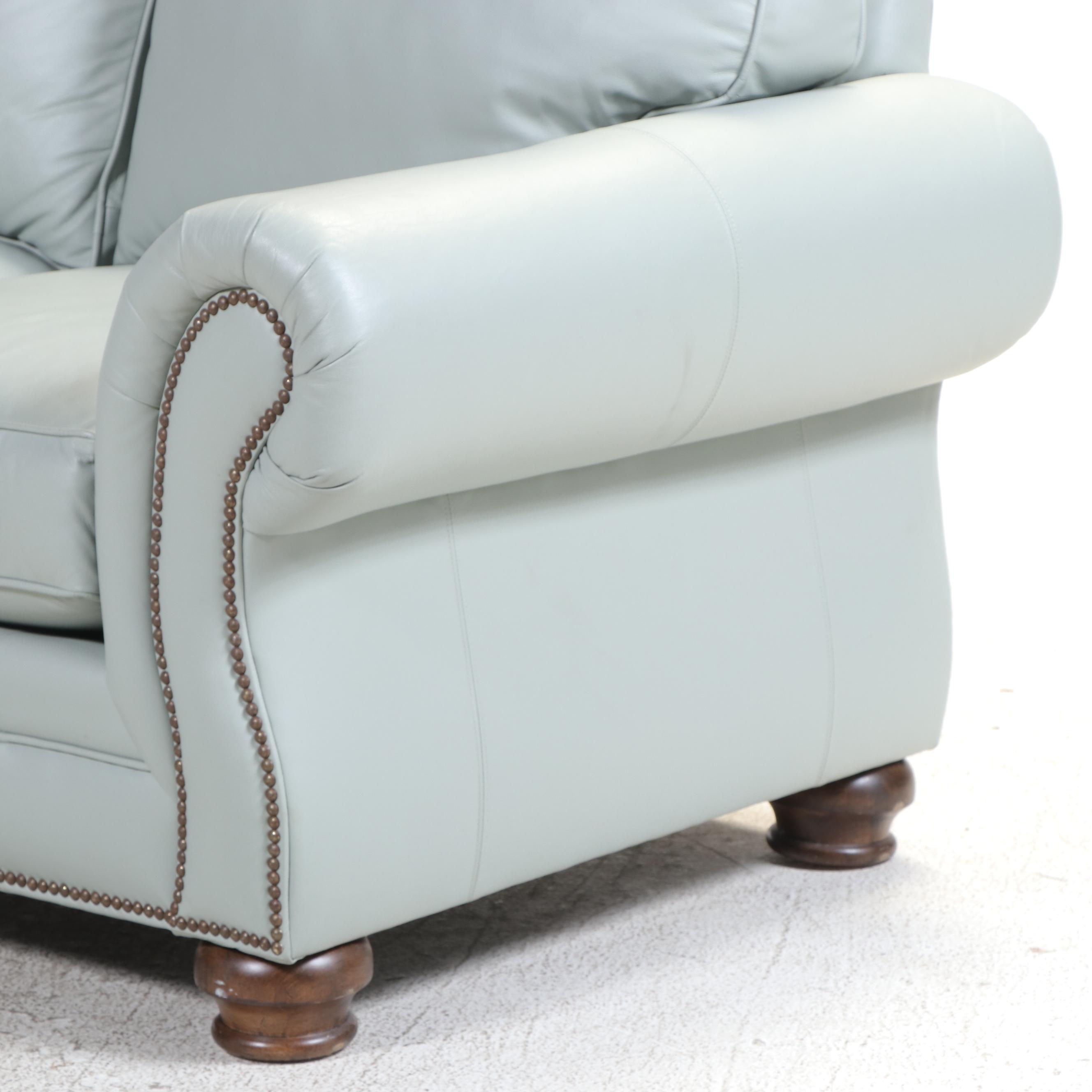 Bassett Leather Loveseat with Nailhead and Wooden Bun Feet