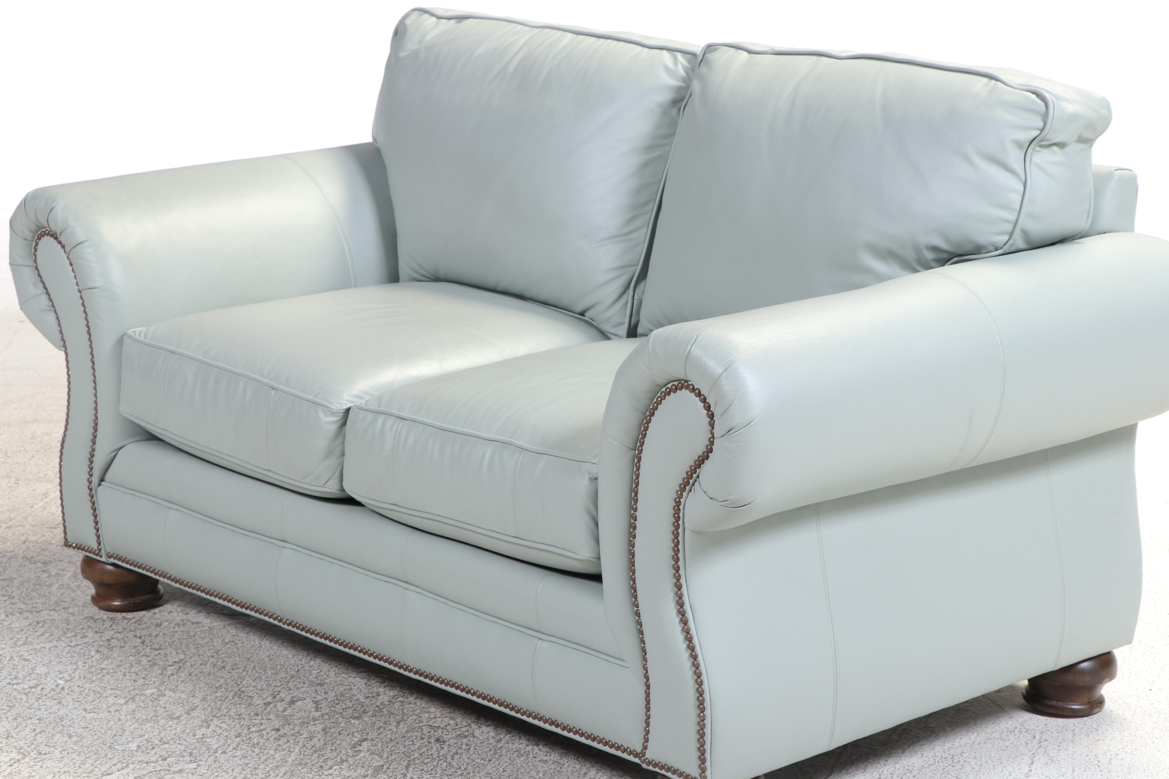 Bassett Leather Loveseat with Nailhead and Wooden Bun Feet