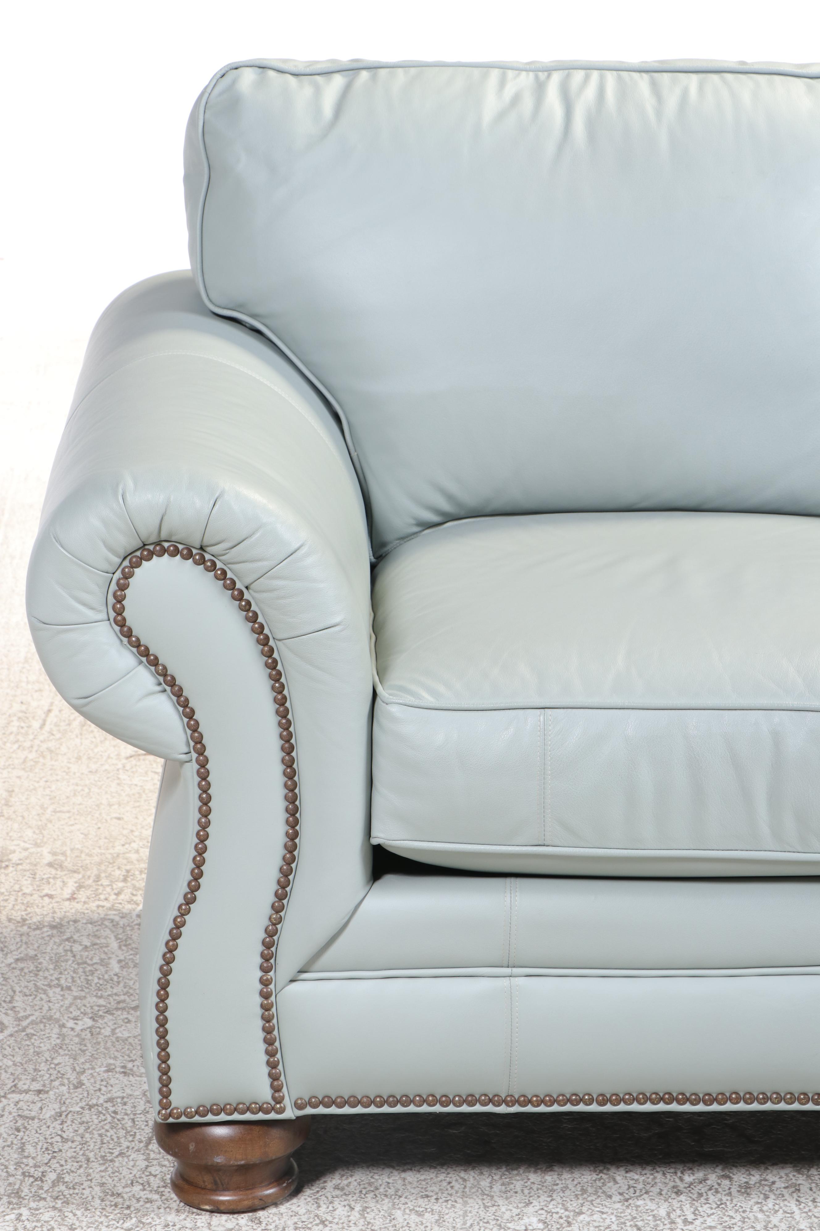 Bassett Leather Loveseat with Nailhead and Wooden Bun Feet