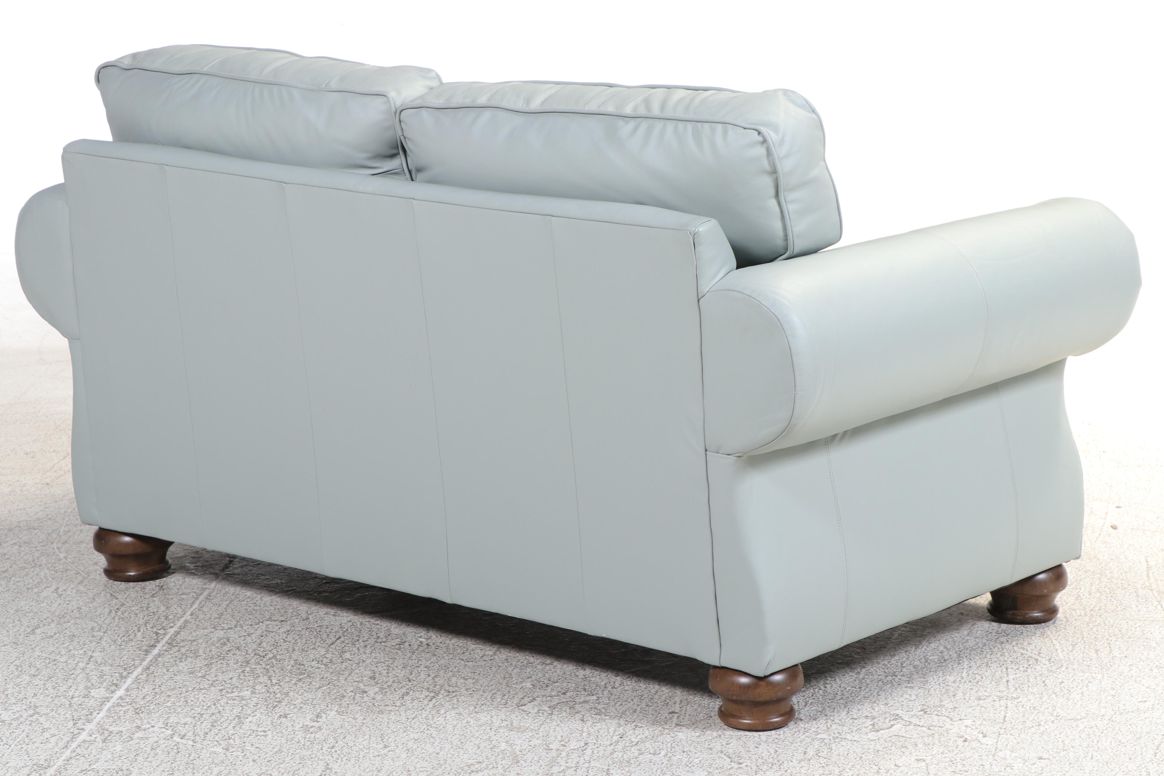 Bassett Leather Loveseat with Nailhead and Wooden Bun Feet