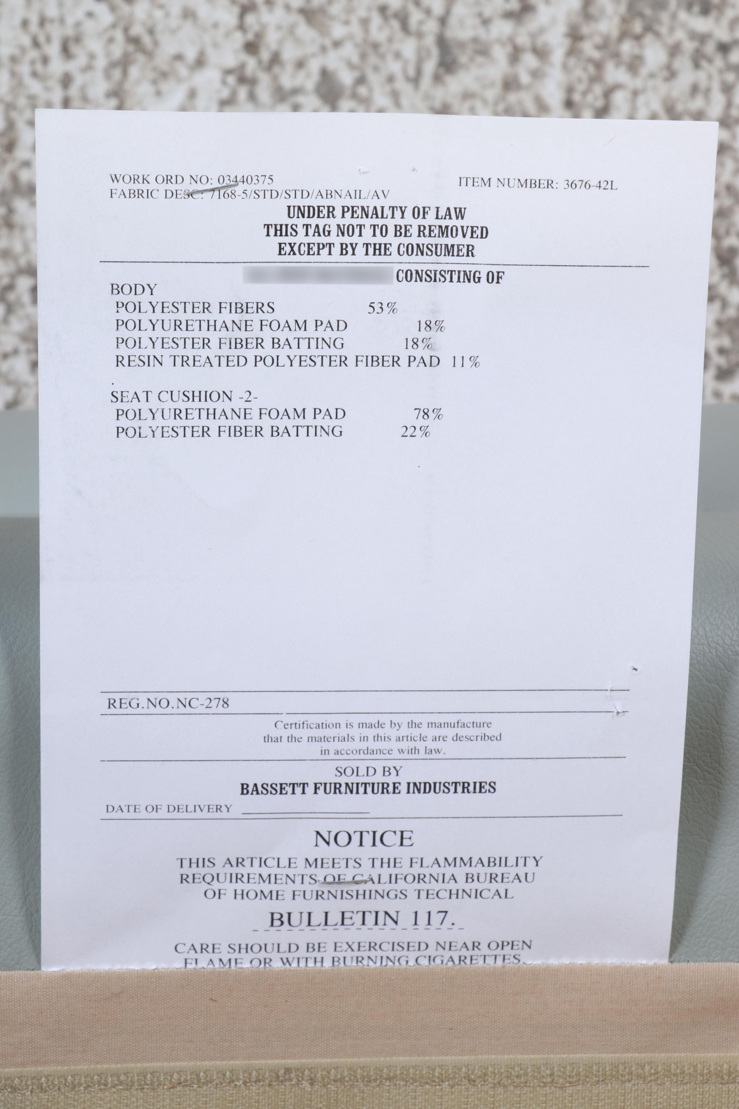 Bassett Leather Loveseat with Nailhead and Wooden Bun Feet