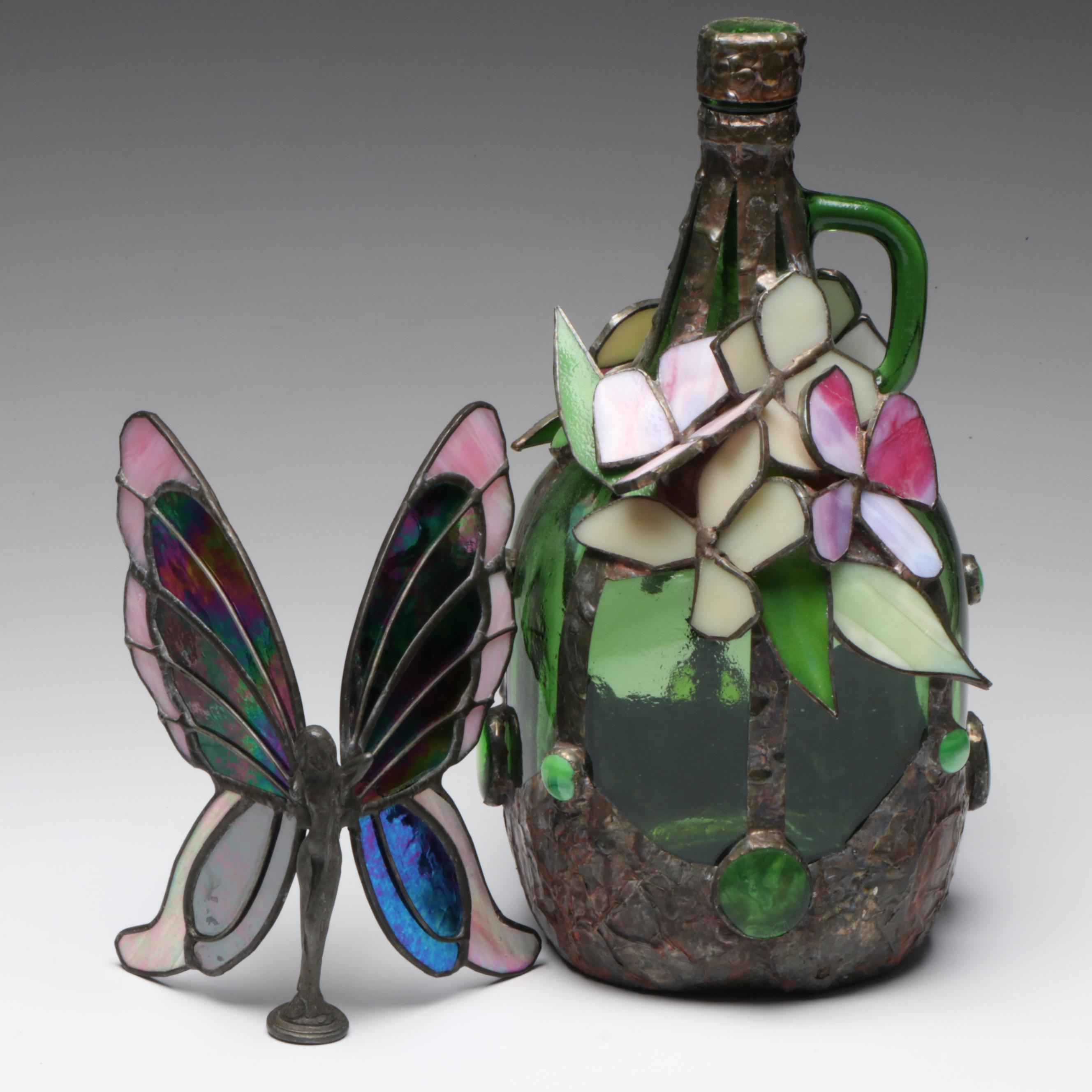 Green Glass Jug with Leaded Slag Glass Floral Accents and Fairy Figurine