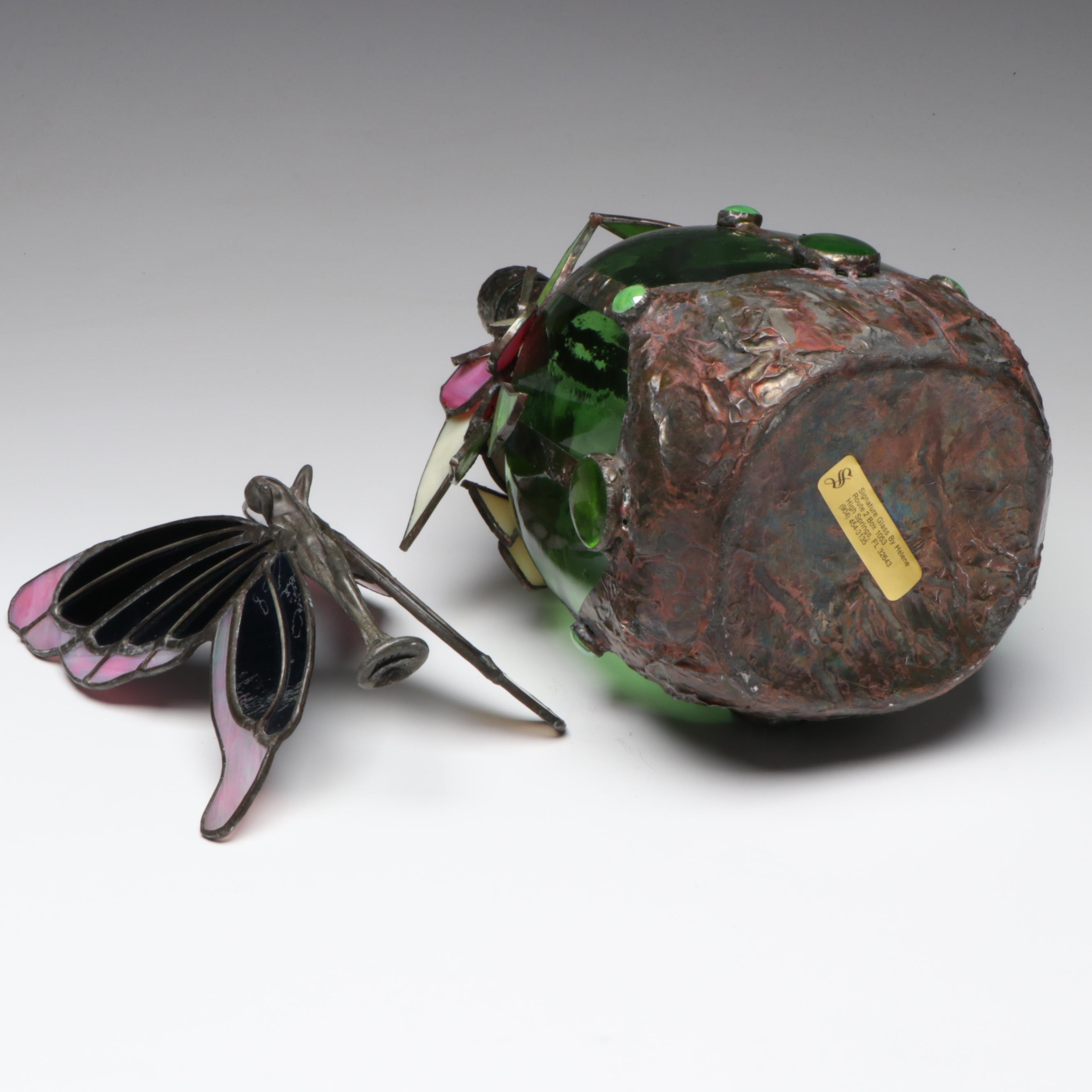 Green Glass Jug with Leaded Slag Glass Floral Accents and Fairy Figurine