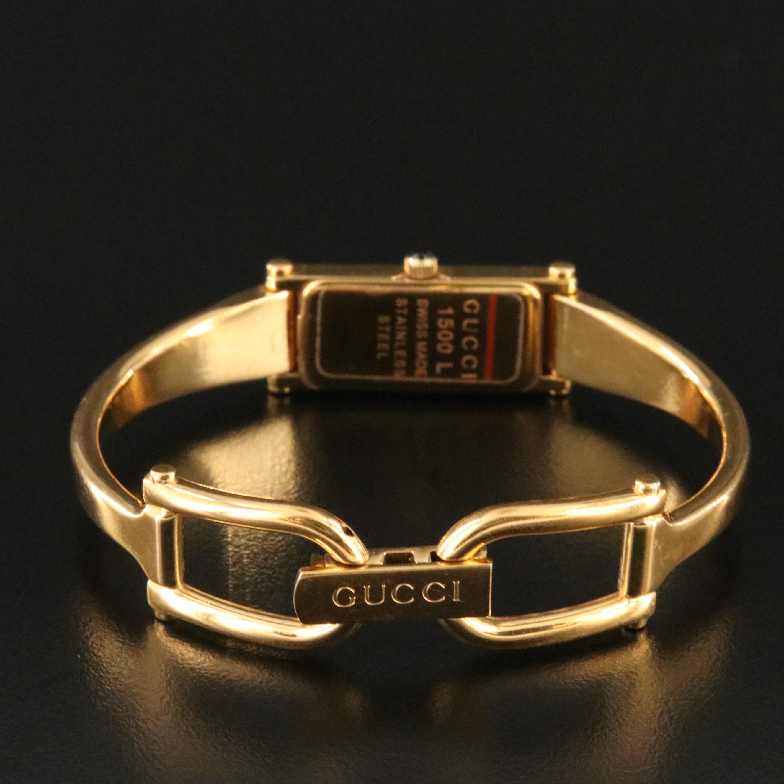 Gucci Yellow Tone Bangle and Stirrup Watch