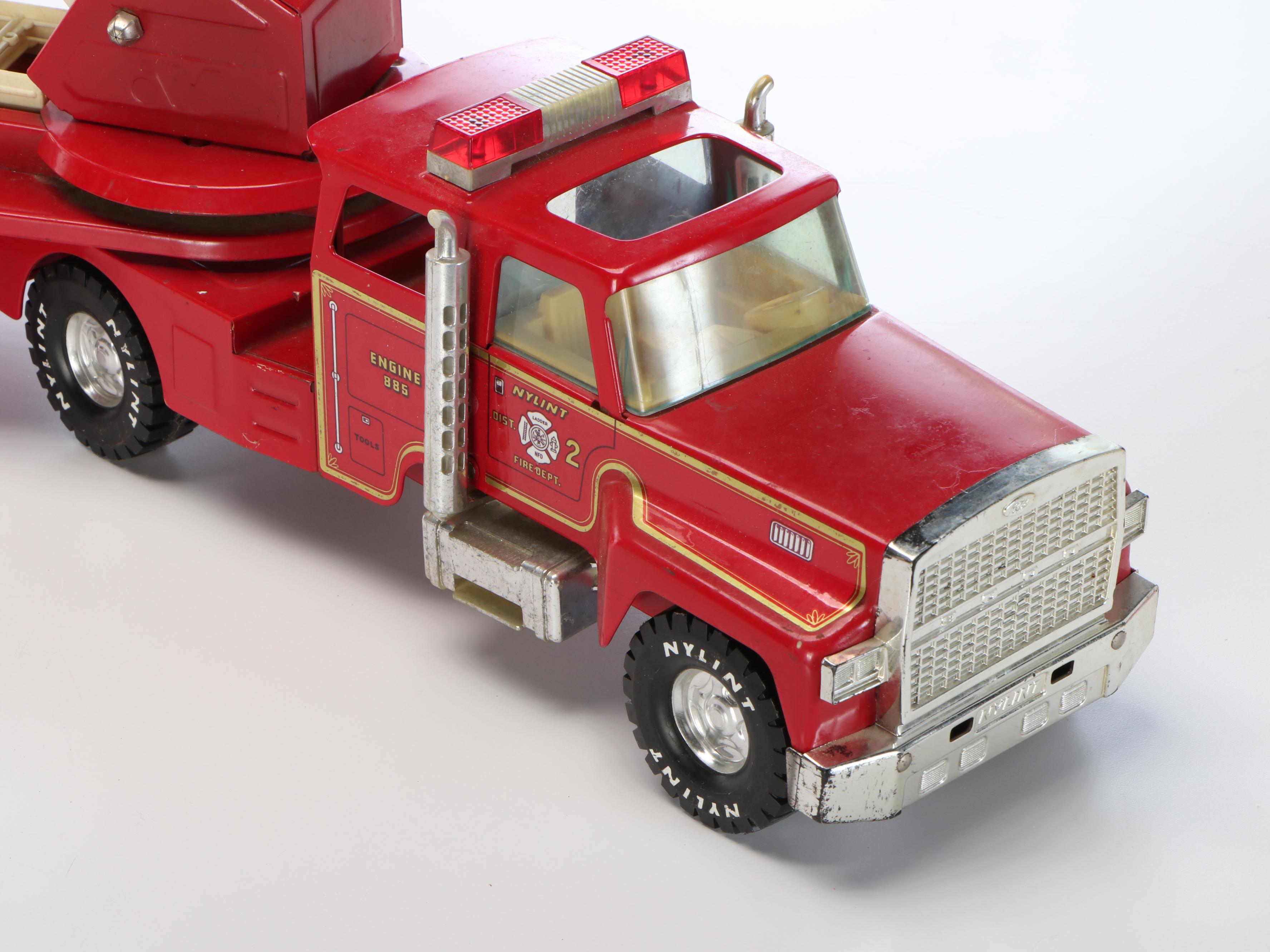 Nylint "Aerial Hook-N-Ladder" and Structo "S.F.D. Fire Truck" Metal Toys