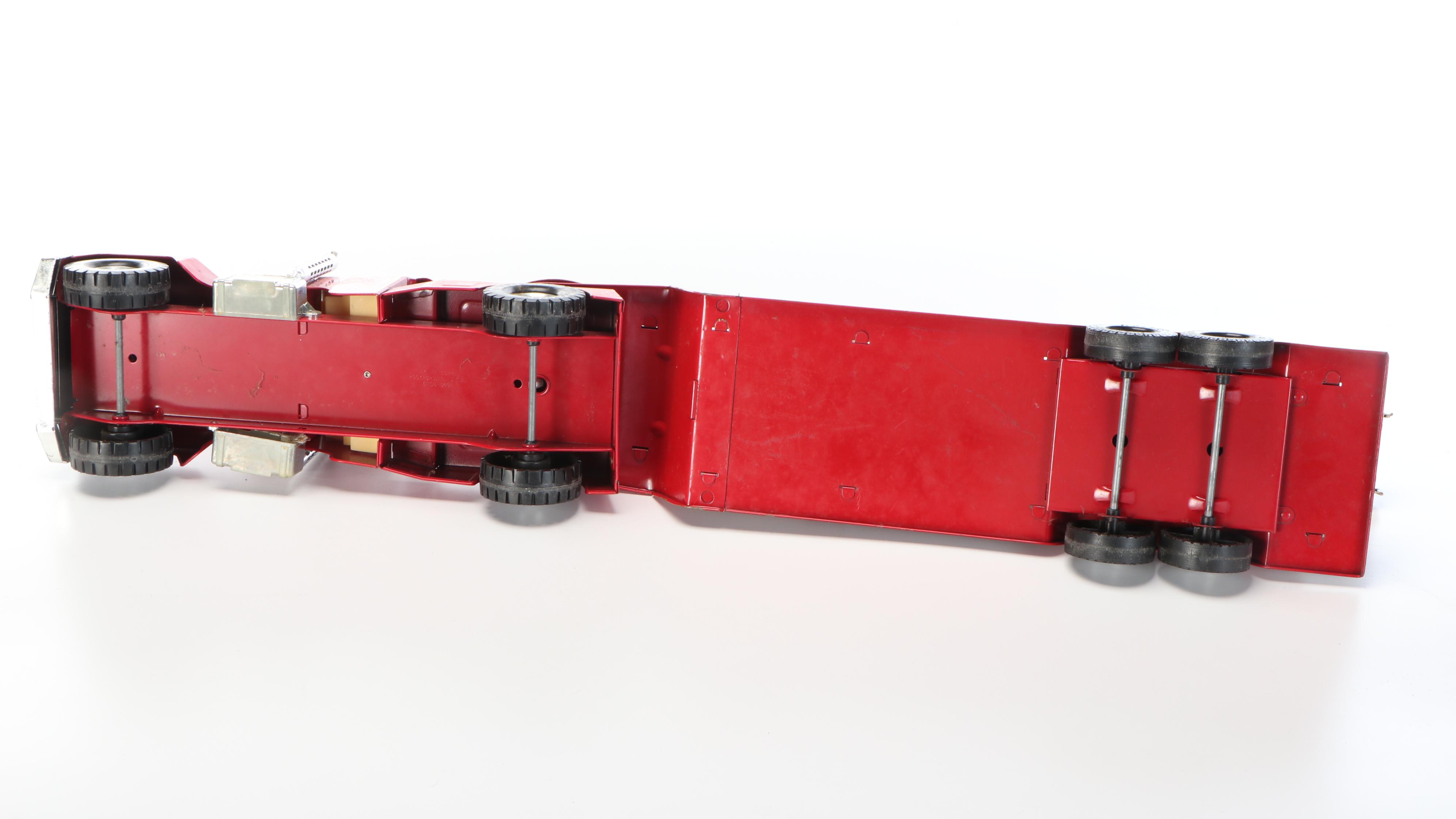 Nylint "Aerial Hook-N-Ladder" and Structo "S.F.D. Fire Truck" Metal Toys