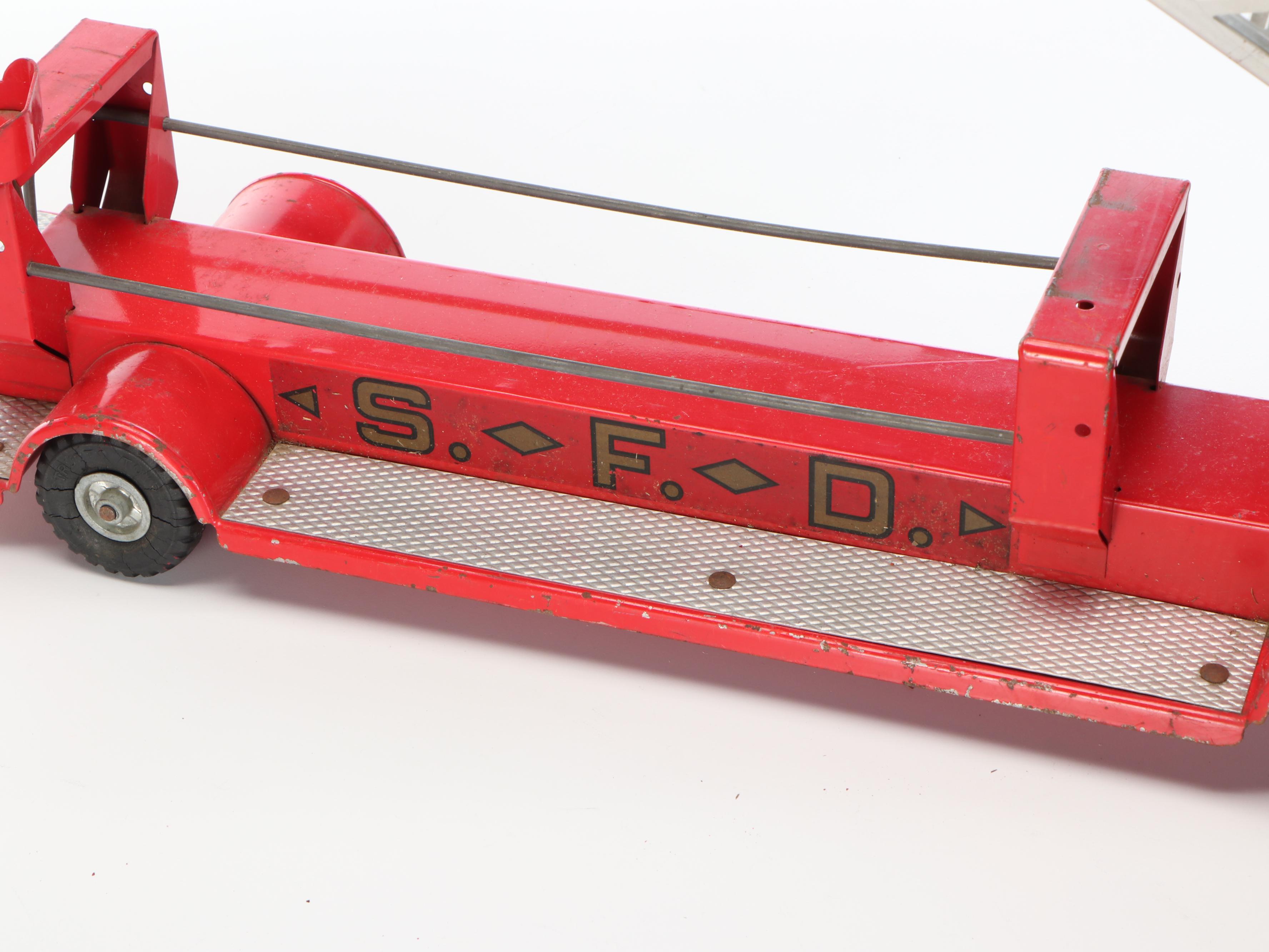 Nylint "Aerial Hook-N-Ladder" and Structo "S.F.D. Fire Truck" Metal Toys