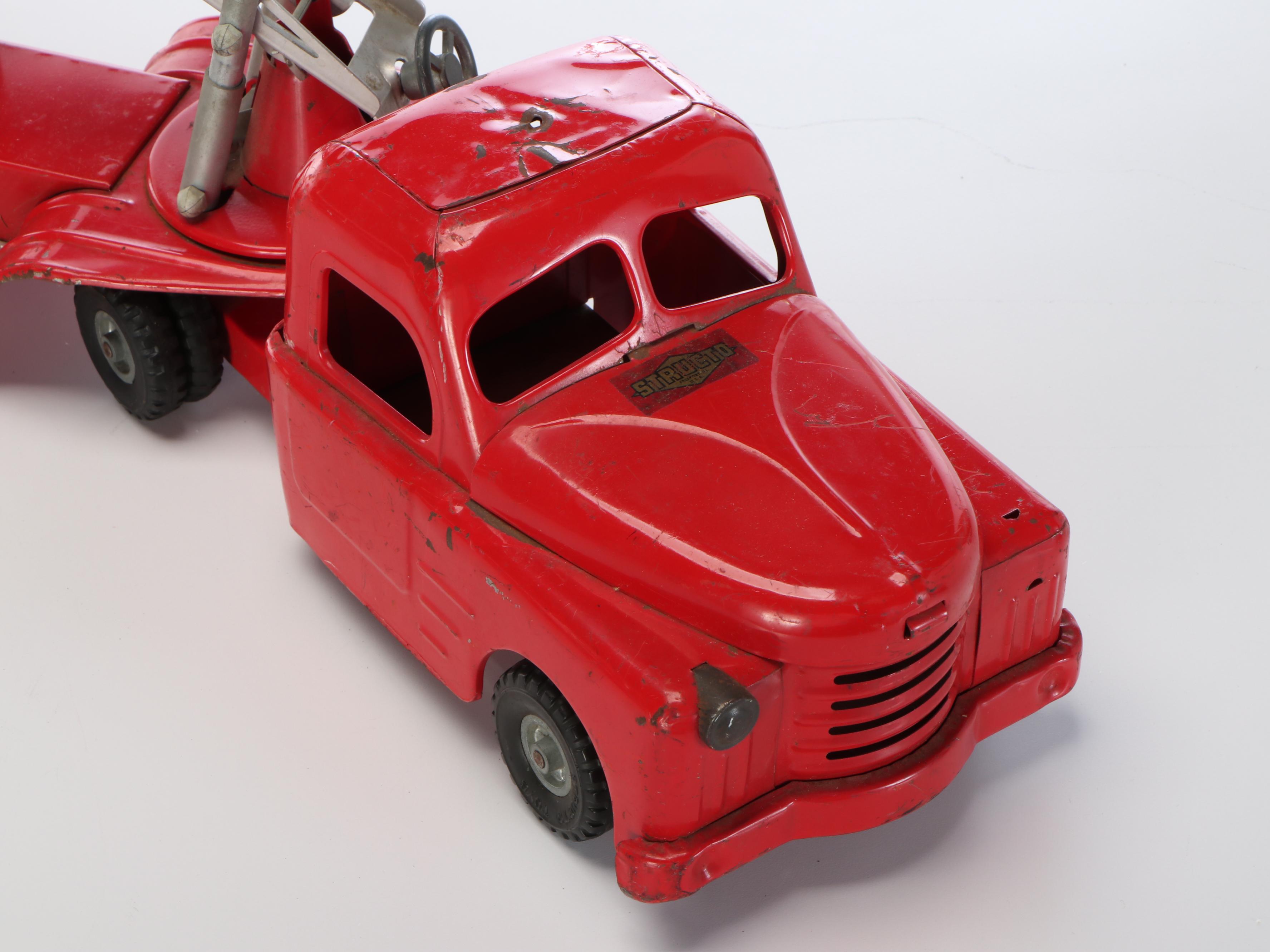 Nylint "Aerial Hook-N-Ladder" and Structo "S.F.D. Fire Truck" Metal Toys