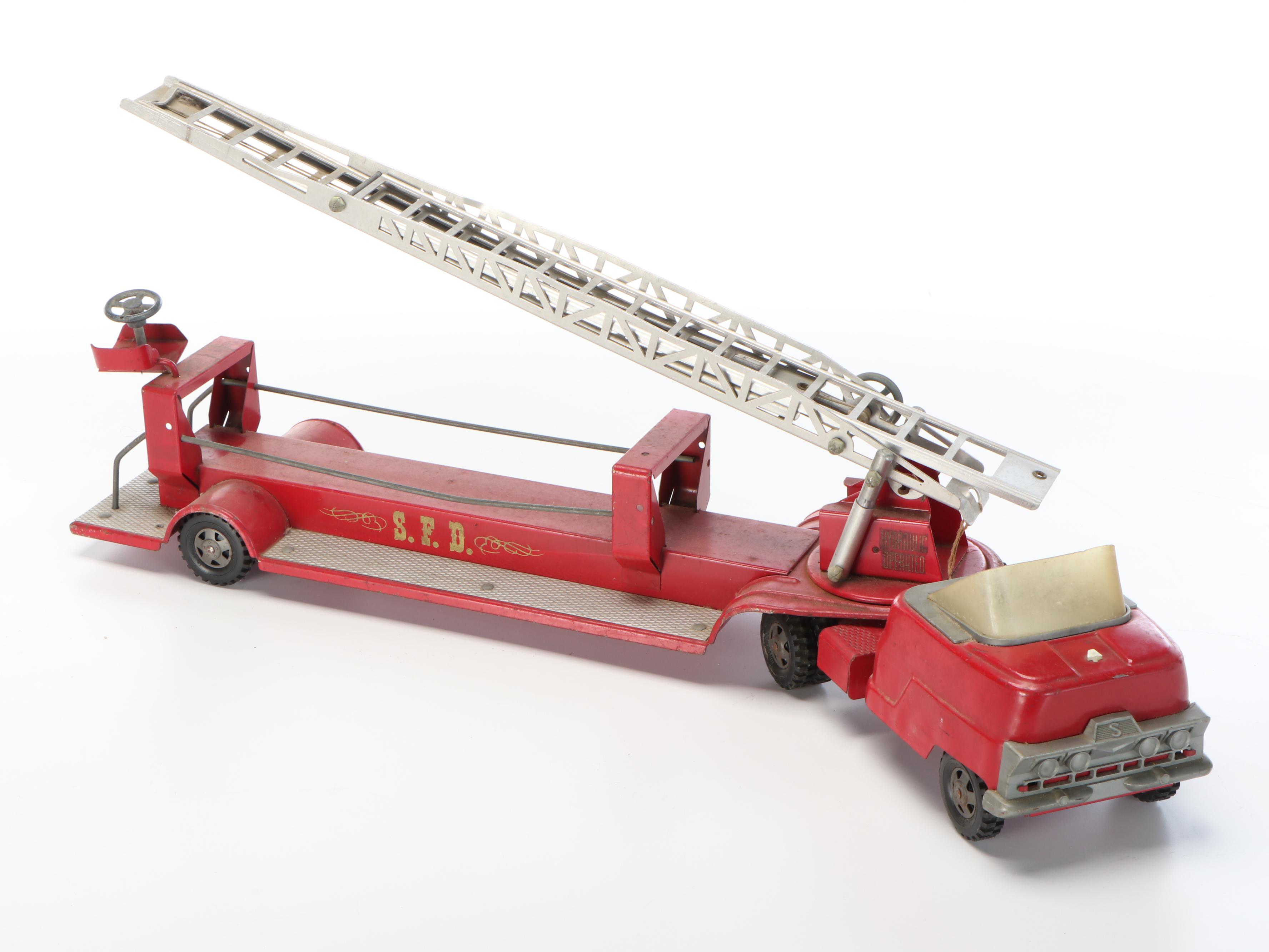 Nylint "Aerial Hook-N-Ladder" and Structo "S.F.D. Fire Truck" Metal Toys