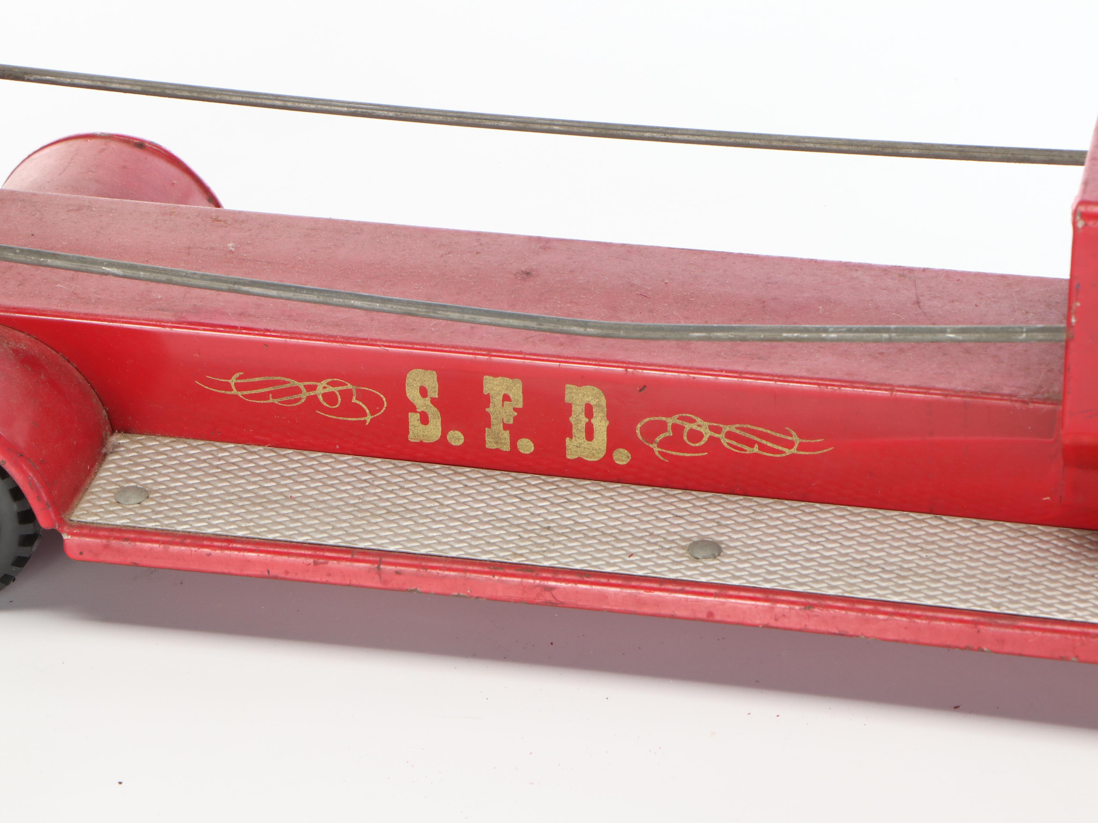 Nylint "Aerial Hook-N-Ladder" and Structo "S.F.D. Fire Truck" Metal Toys