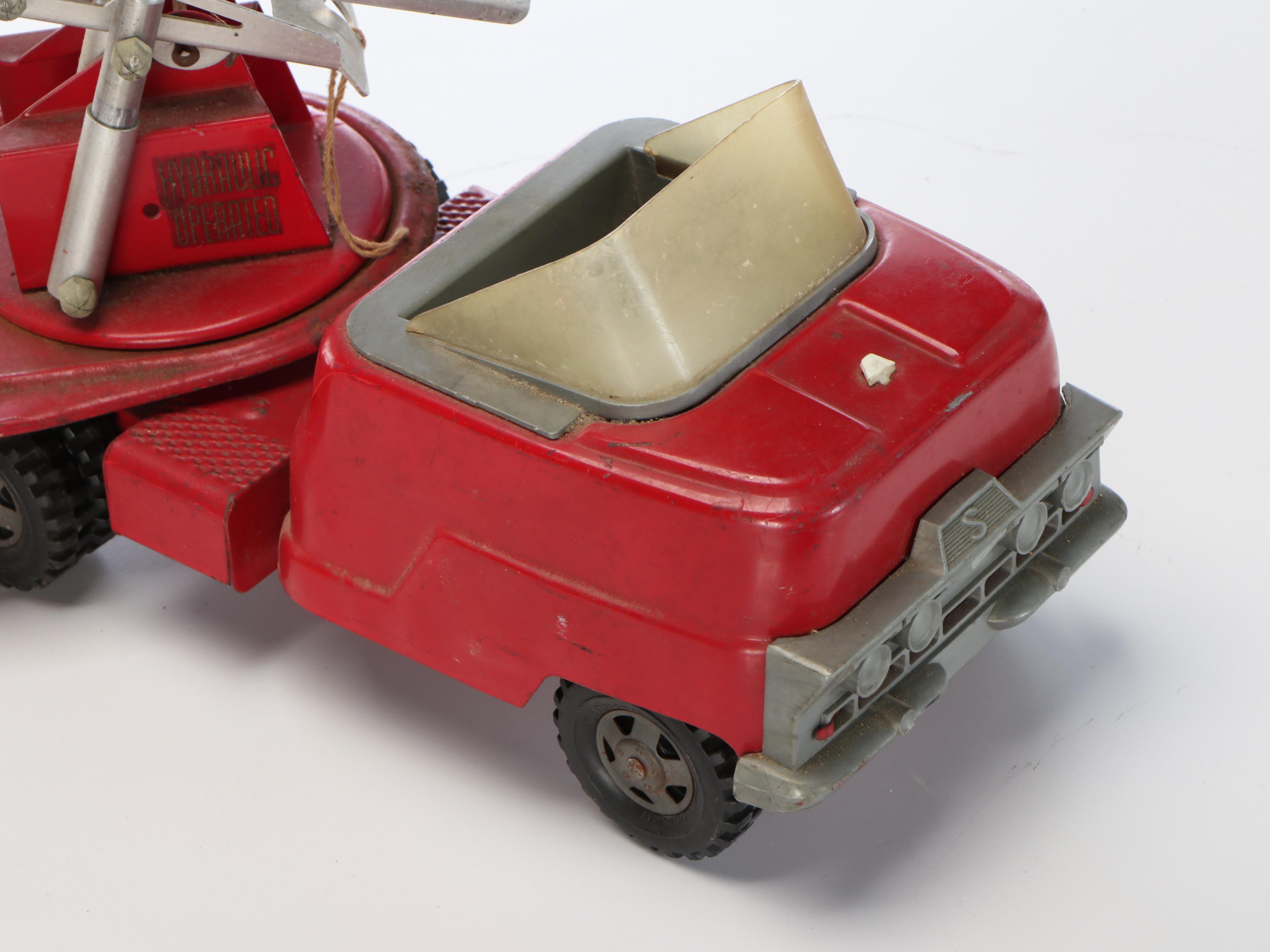 Nylint "Aerial Hook-N-Ladder" and Structo "S.F.D. Fire Truck" Metal Toys