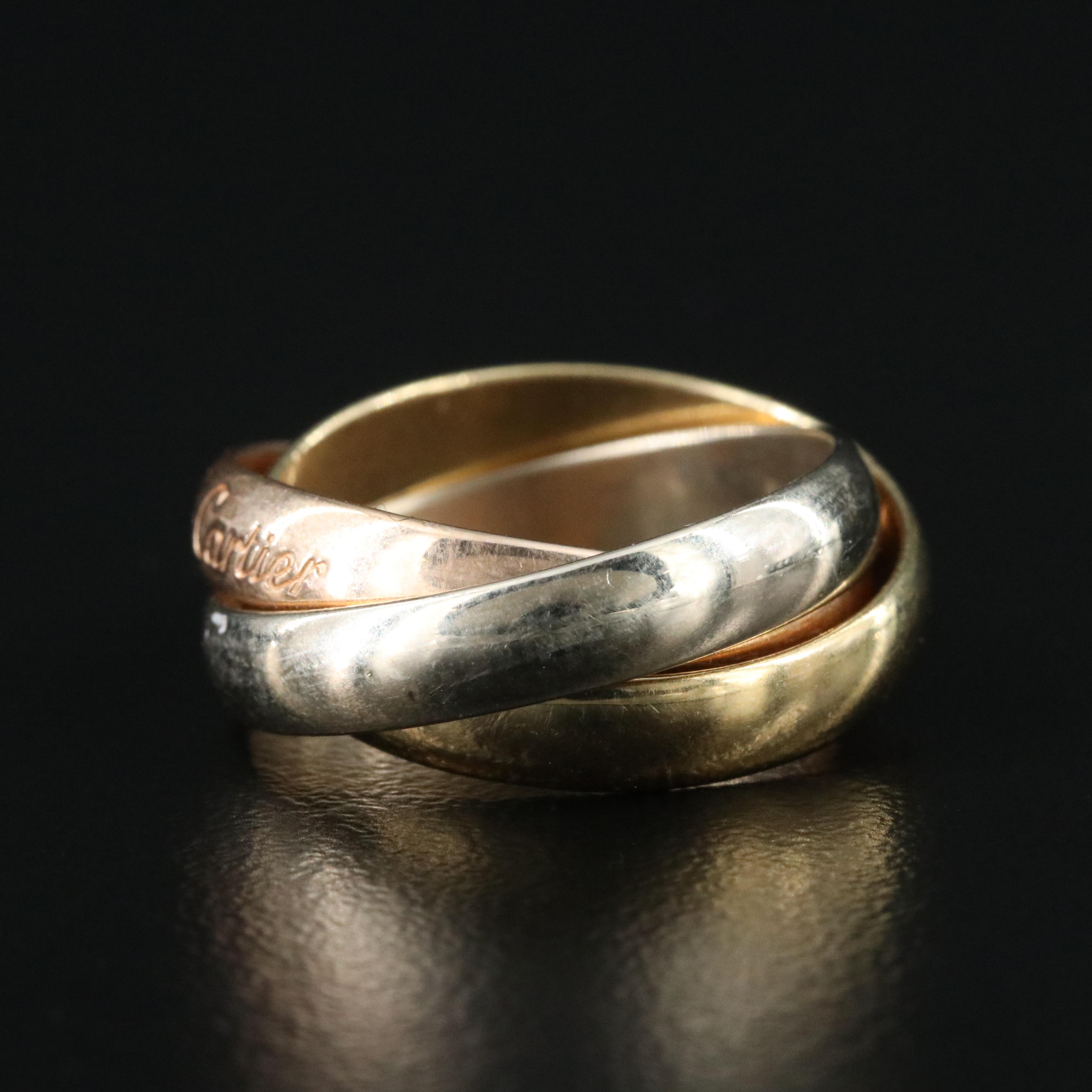 Les Must de Cartier 18K Tri-Color Trinity Rolling Ring