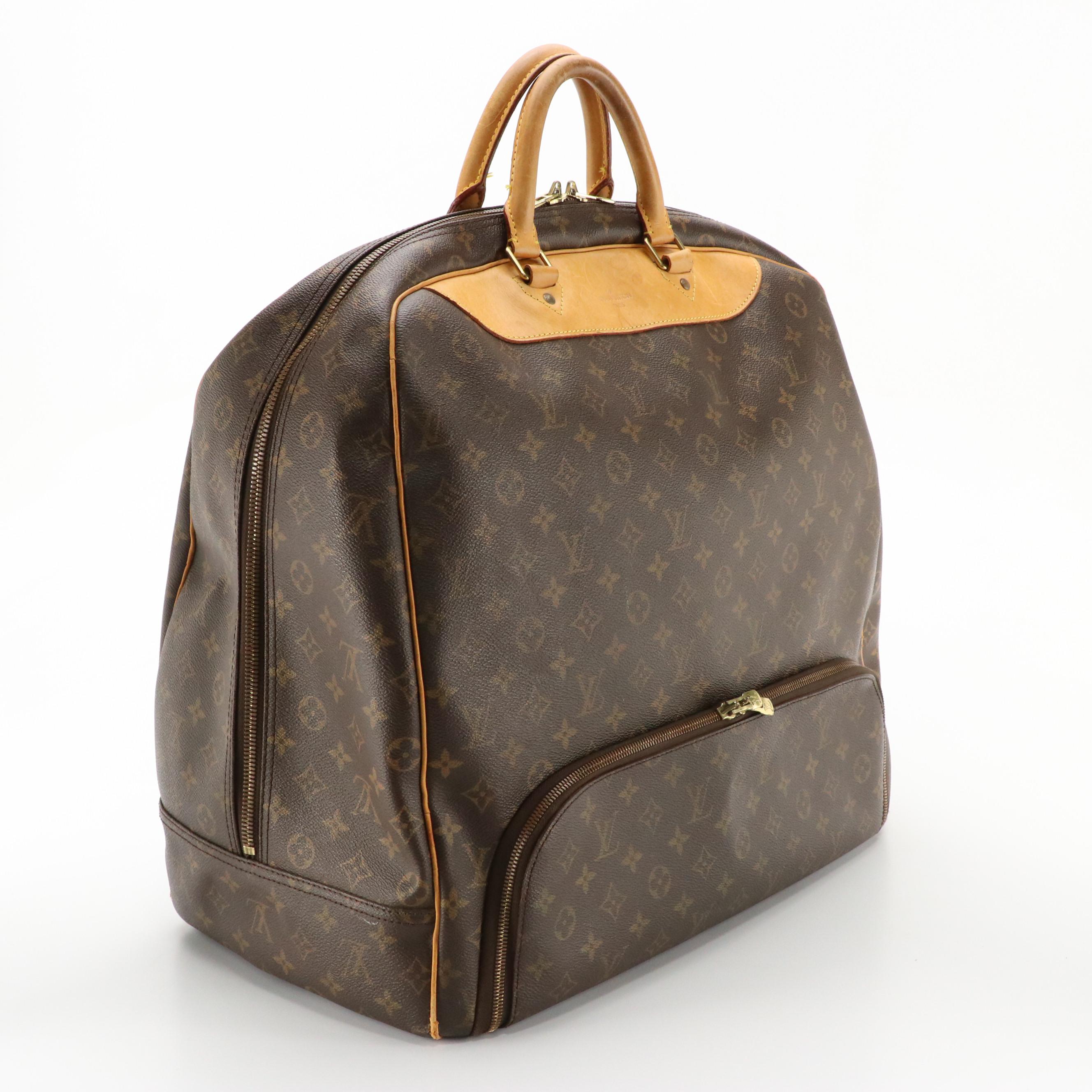 Louis Vuitton Evasion Travel Bag in Monogram Canvas and Vachetta Leather