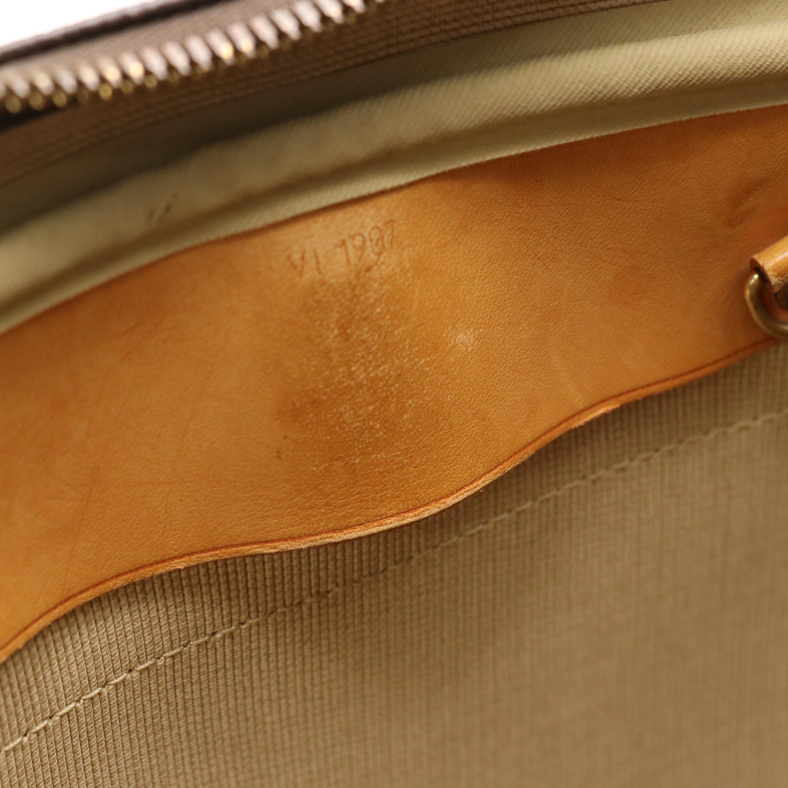 Louis Vuitton Evasion Travel Bag in Monogram Canvas and Vachetta Leather