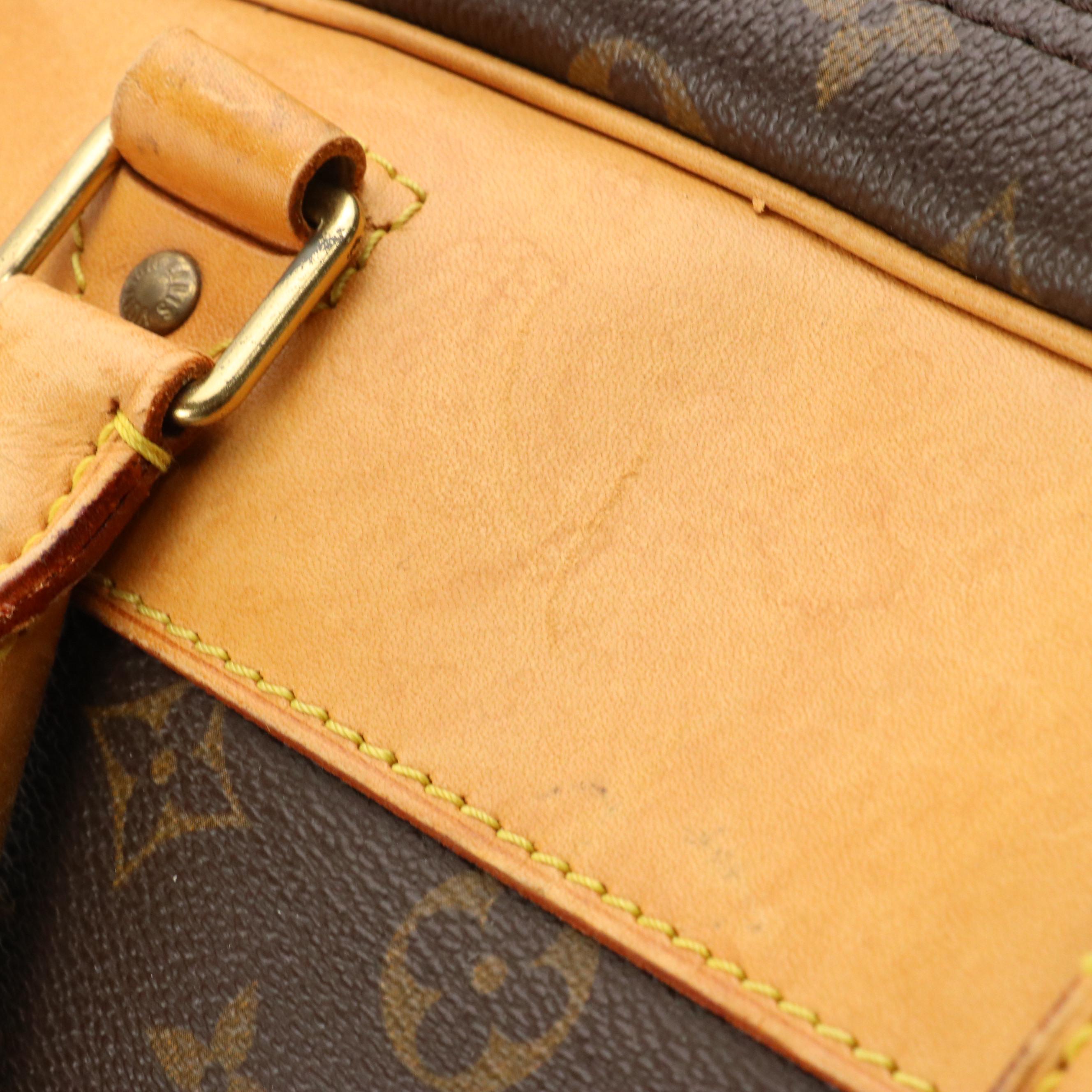 Louis Vuitton Evasion Travel Bag in Monogram Canvas and Vachetta Leather