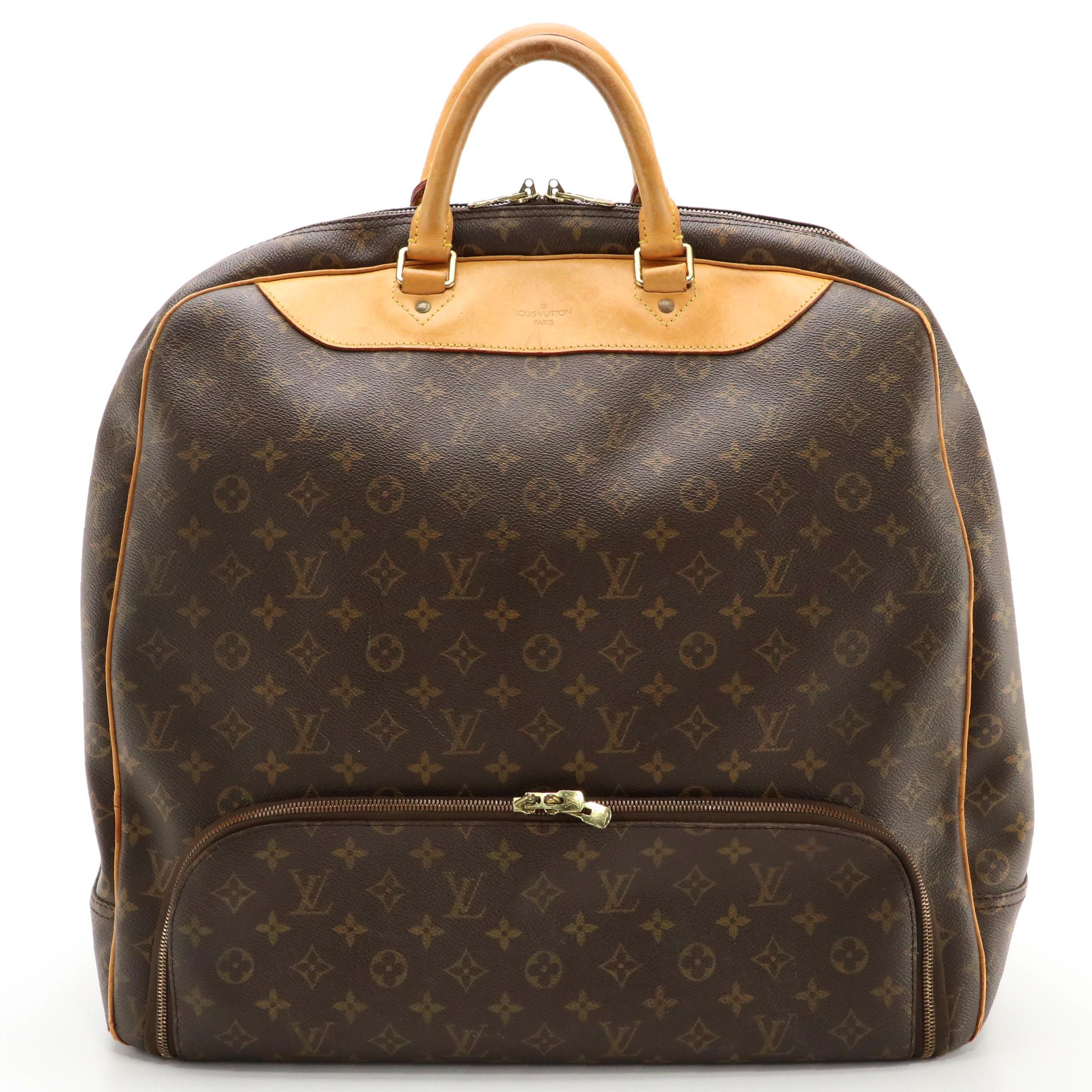 Louis Vuitton Evasion Travel Bag in Monogram Canvas and Vachetta Leather