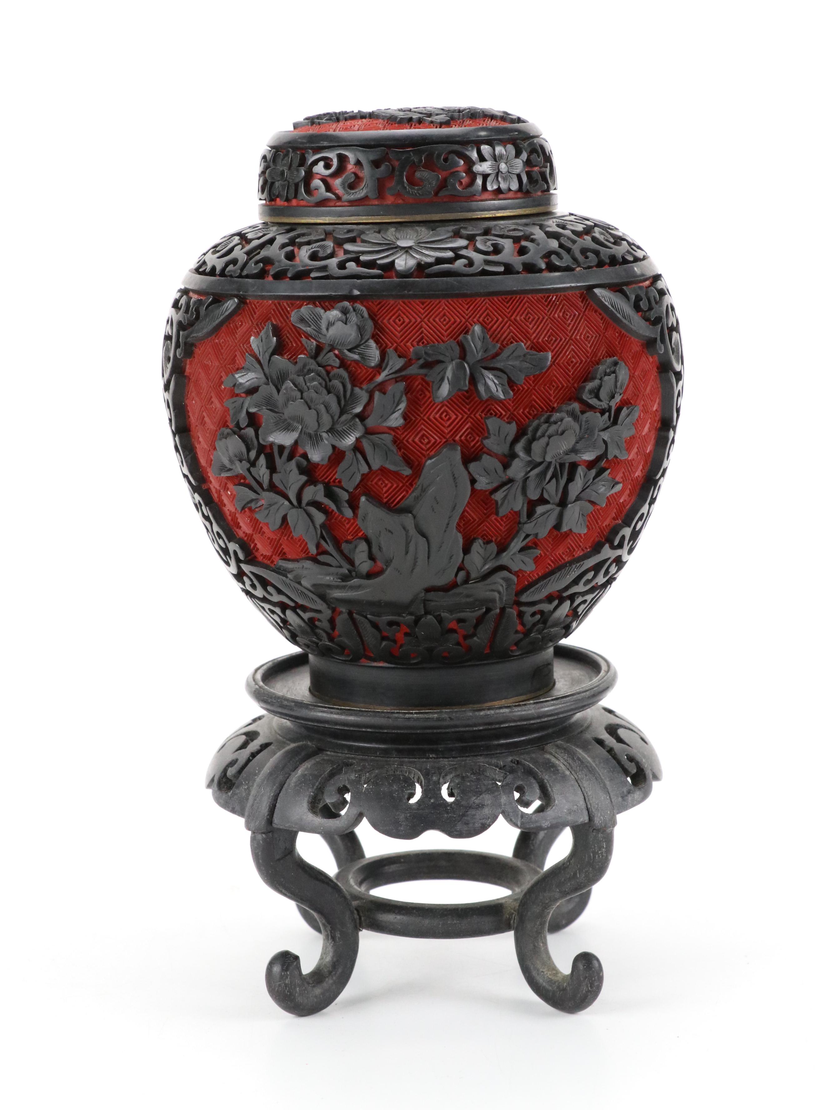 Chinese Black on Red Cinnabar Ginger Jar with Ebonized Wood Stand