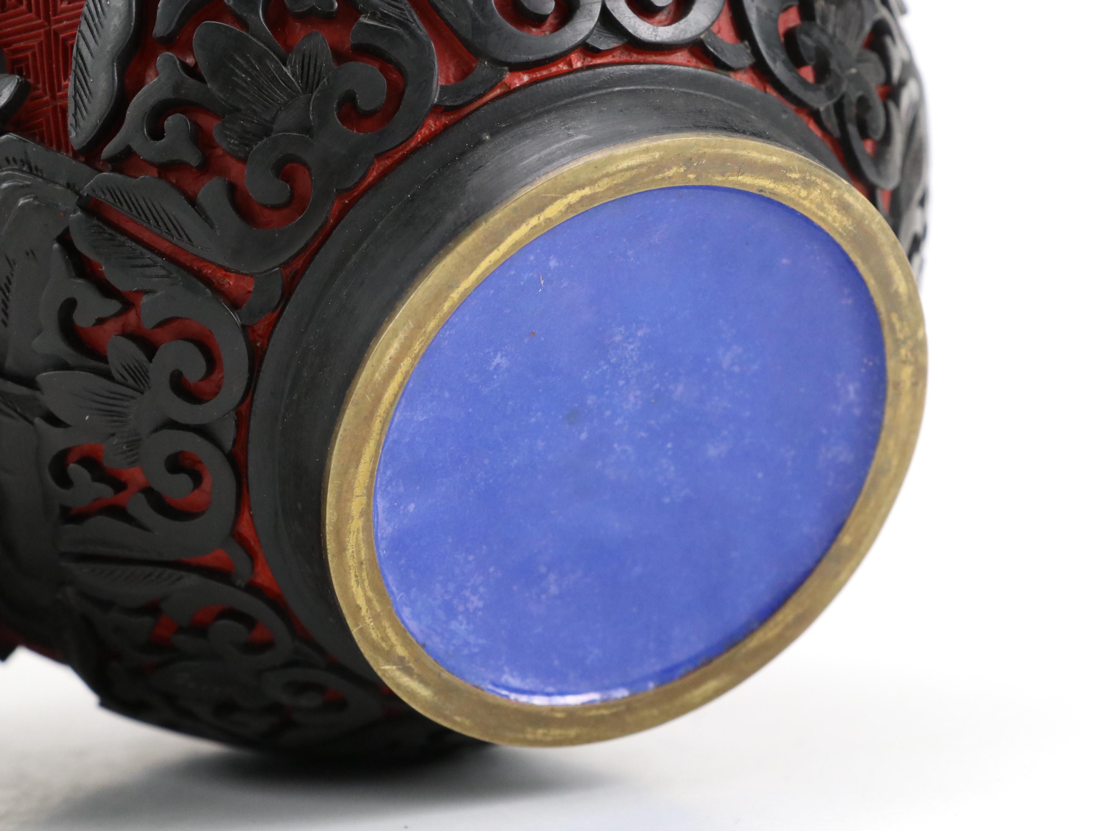 Chinese Black on Red Cinnabar Ginger Jar with Ebonized Wood Stand