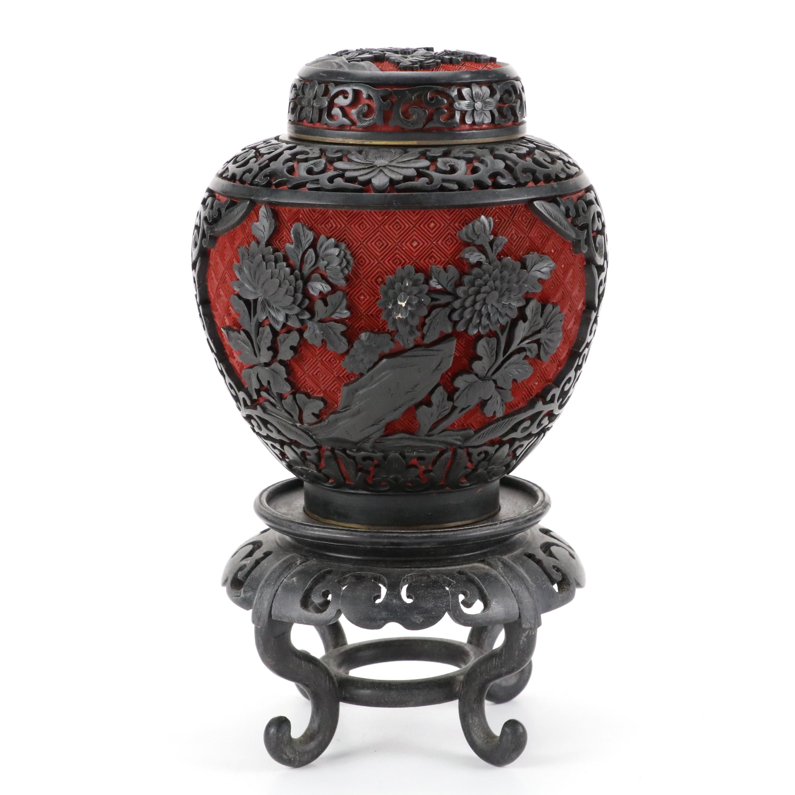 Chinese Black on Red Cinnabar Ginger Jar with Ebonized Wood Stand