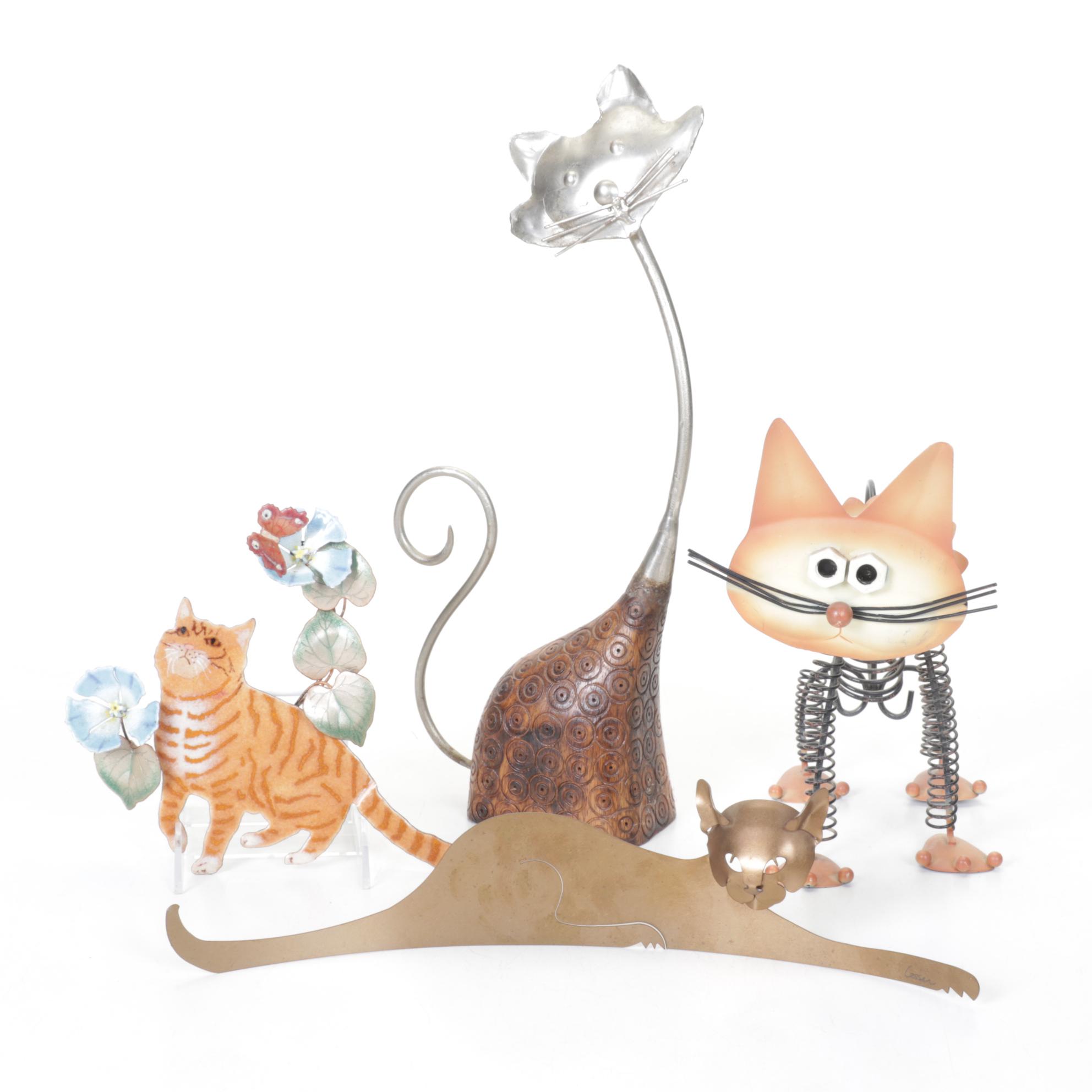 Four Metal Cat Figurines