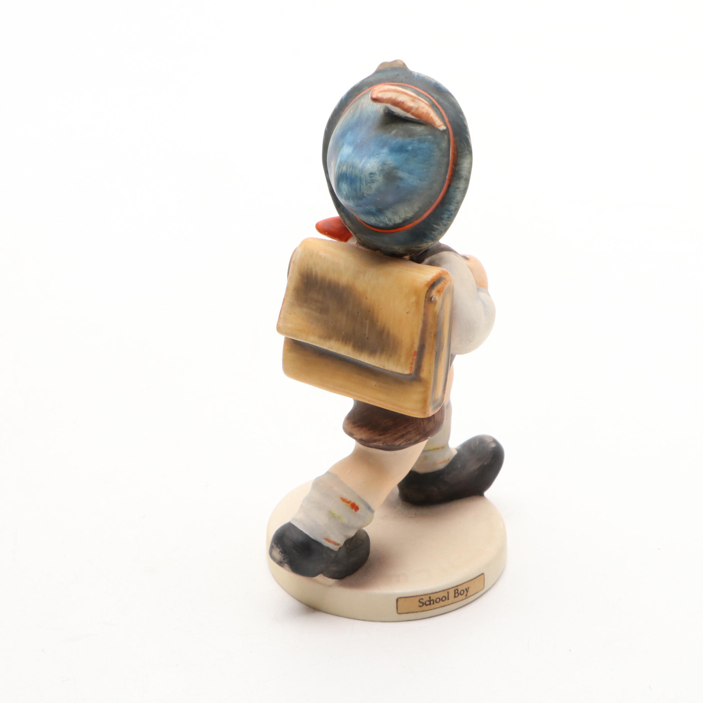 Goebel Cheryl Johnson Vase with "School Boy" and Other Hummel Figurines