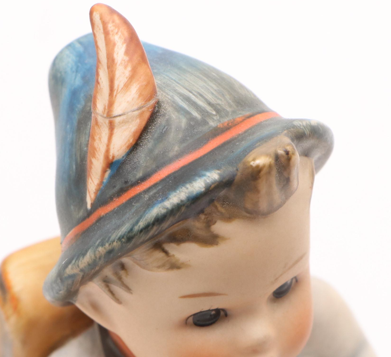 Goebel Cheryl Johnson Vase with "School Boy" and Other Hummel Figurines