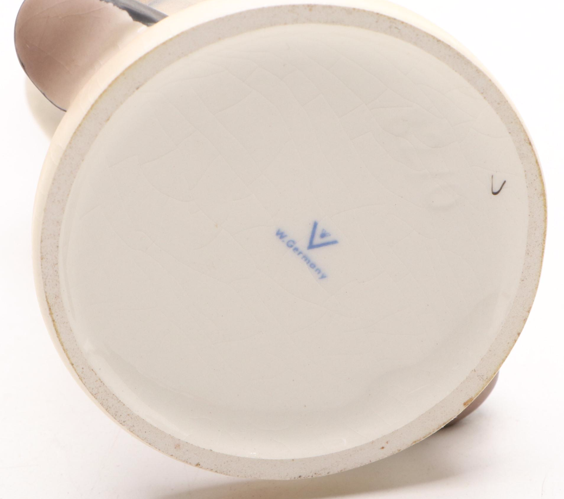 Goebel Cheryl Johnson Vase with "School Boy" and Other Hummel Figurines