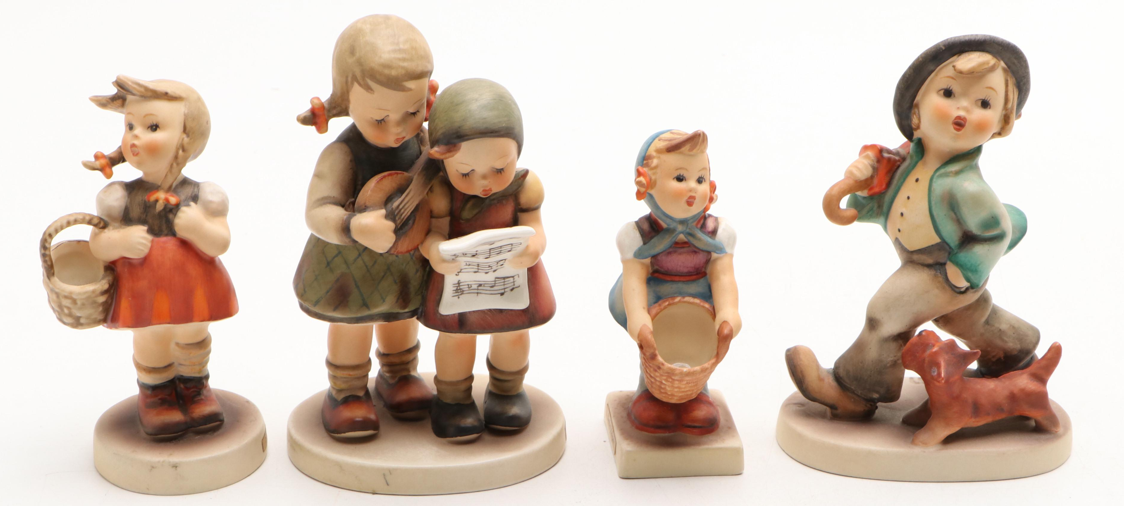 Goebel Cheryl Johnson Vase with "School Boy" and Other Hummel Figurines