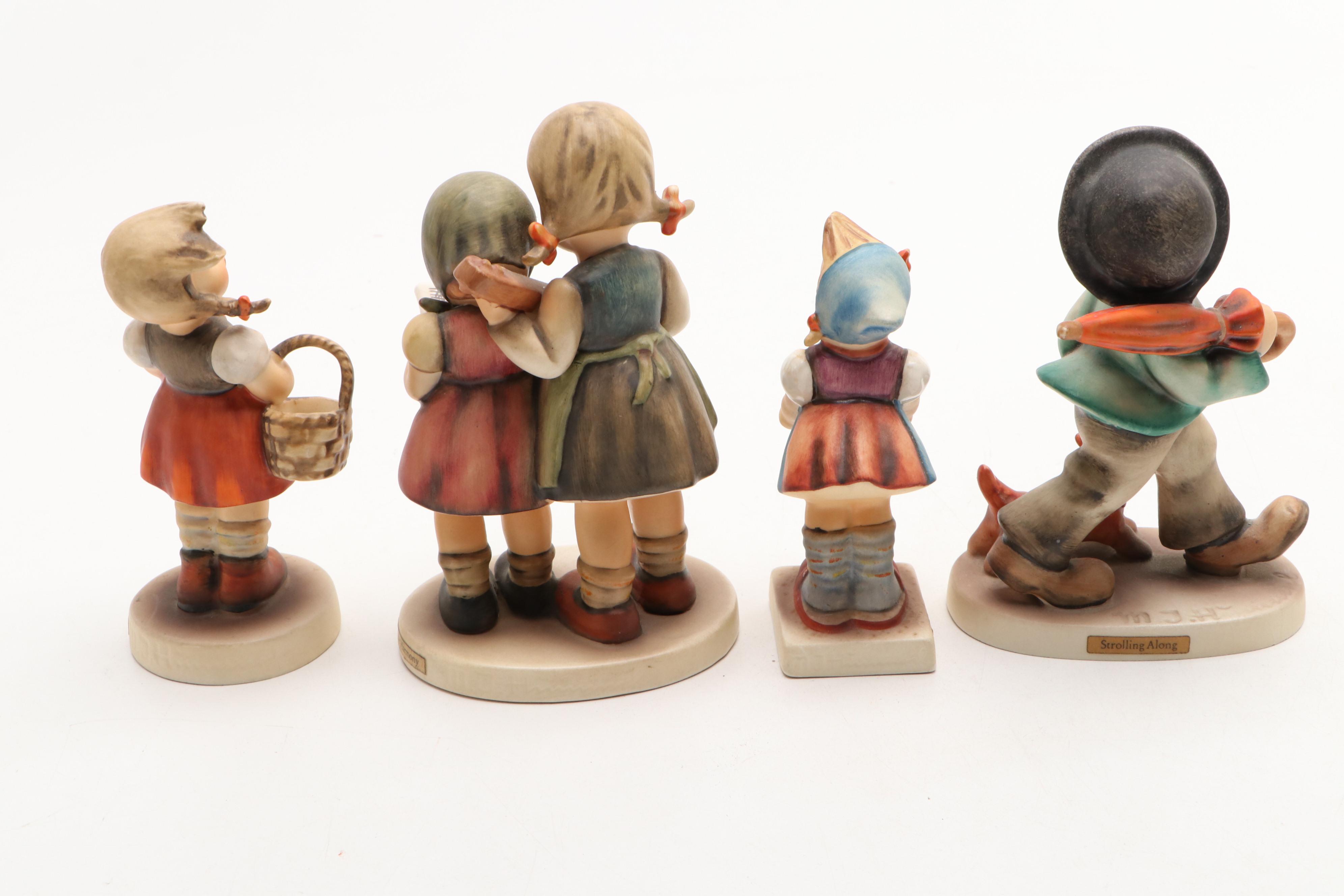 Goebel Cheryl Johnson Vase with "School Boy" and Other Hummel Figurines