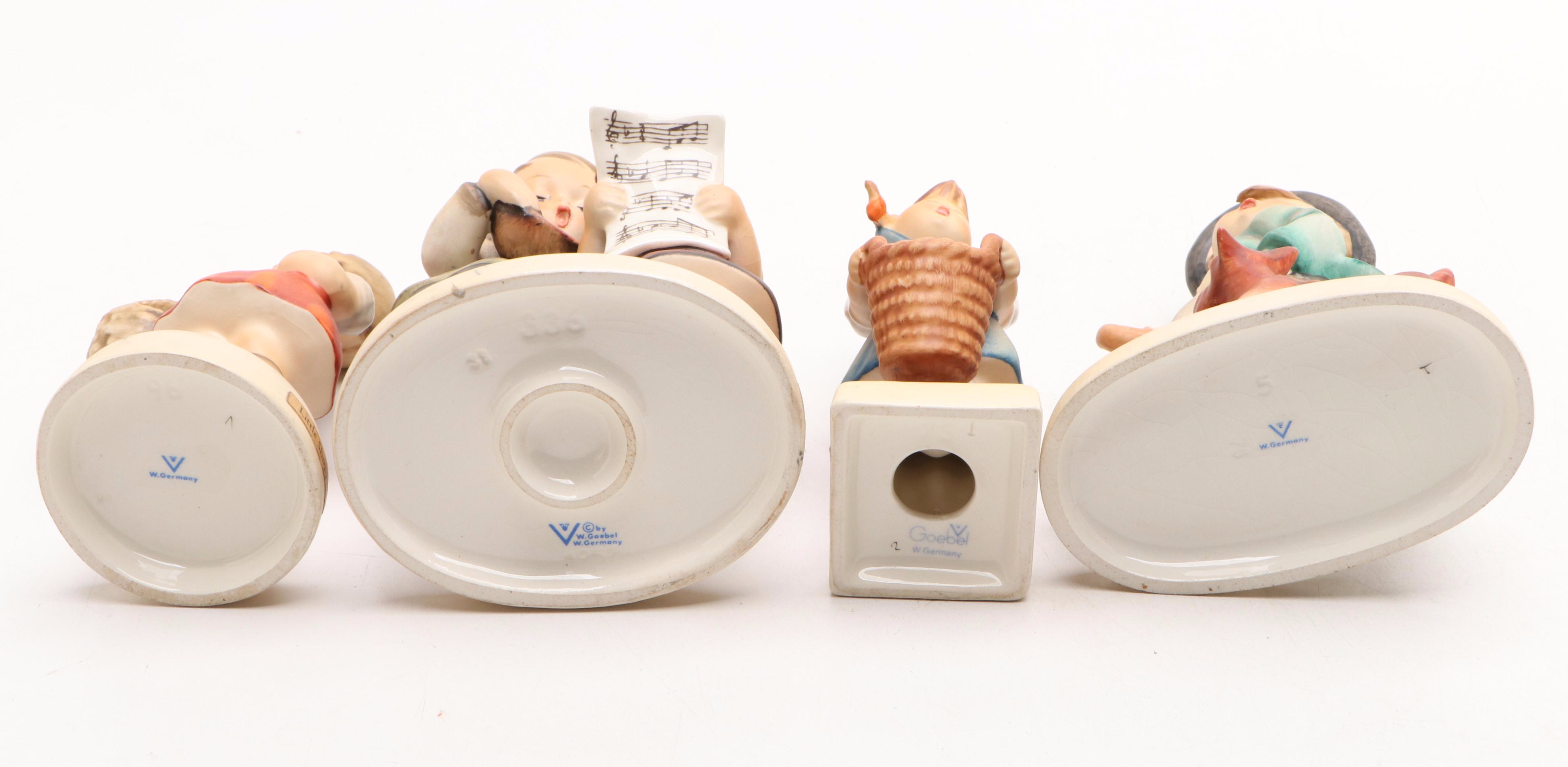 Goebel Cheryl Johnson Vase with "School Boy" and Other Hummel Figurines