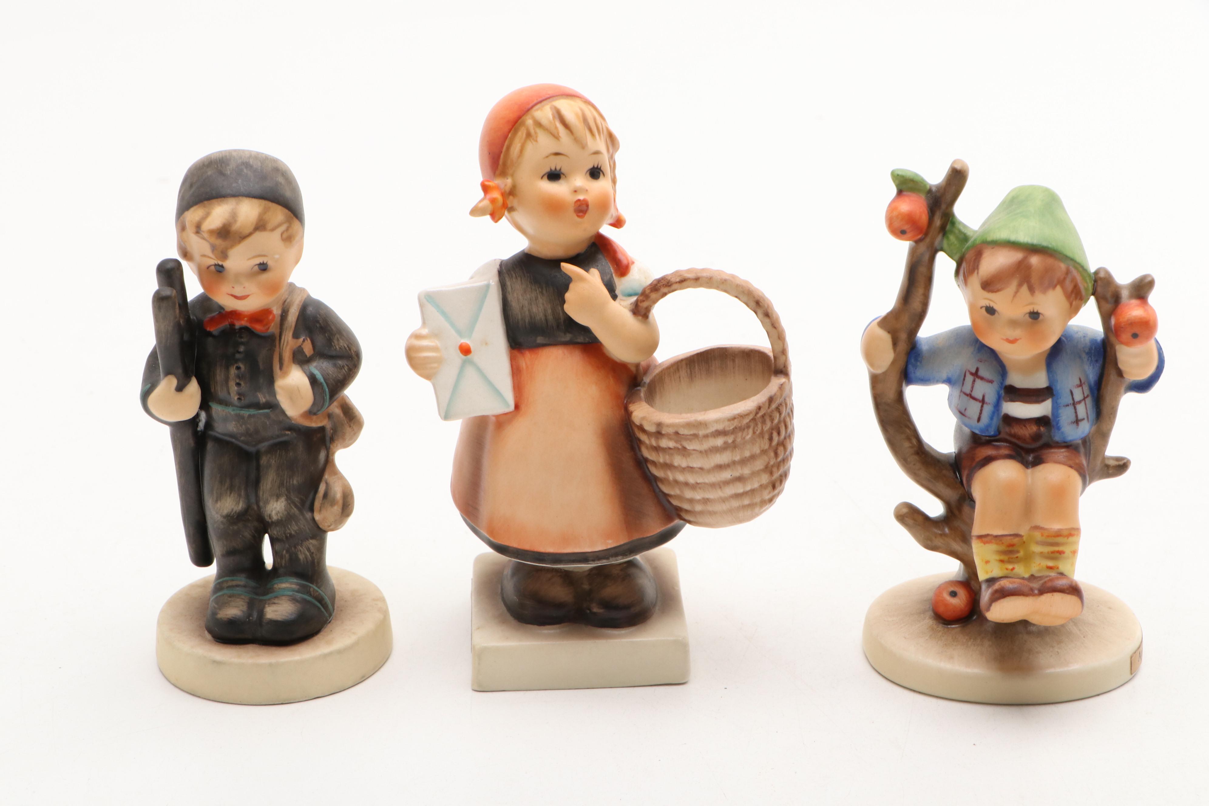 Goebel Cheryl Johnson Vase with "School Boy" and Other Hummel Figurines