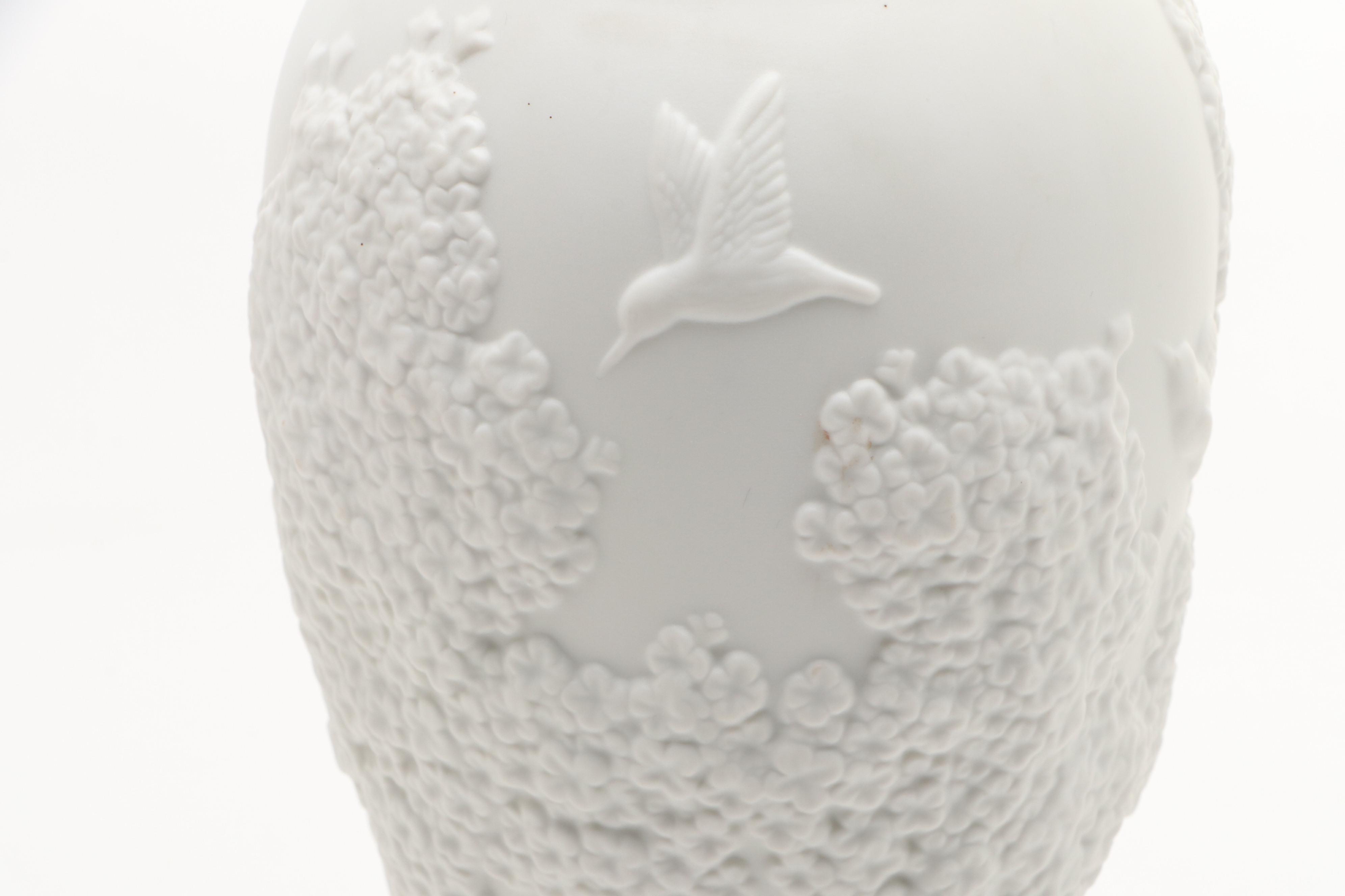 Goebel Cheryl Johnson Vase with "School Boy" and Other Hummel Figurines