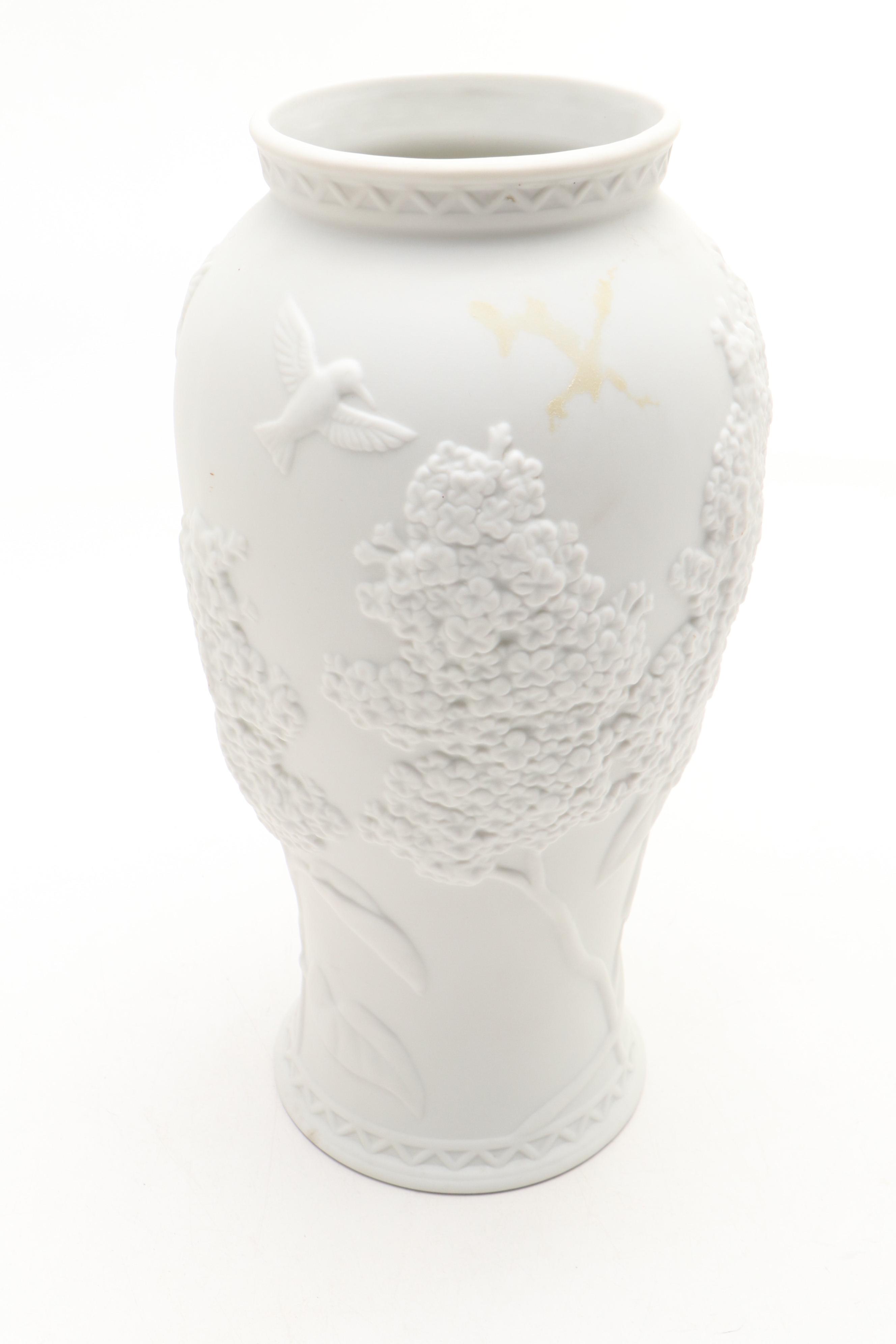 Goebel Cheryl Johnson Vase with "School Boy" and Other Hummel Figurines