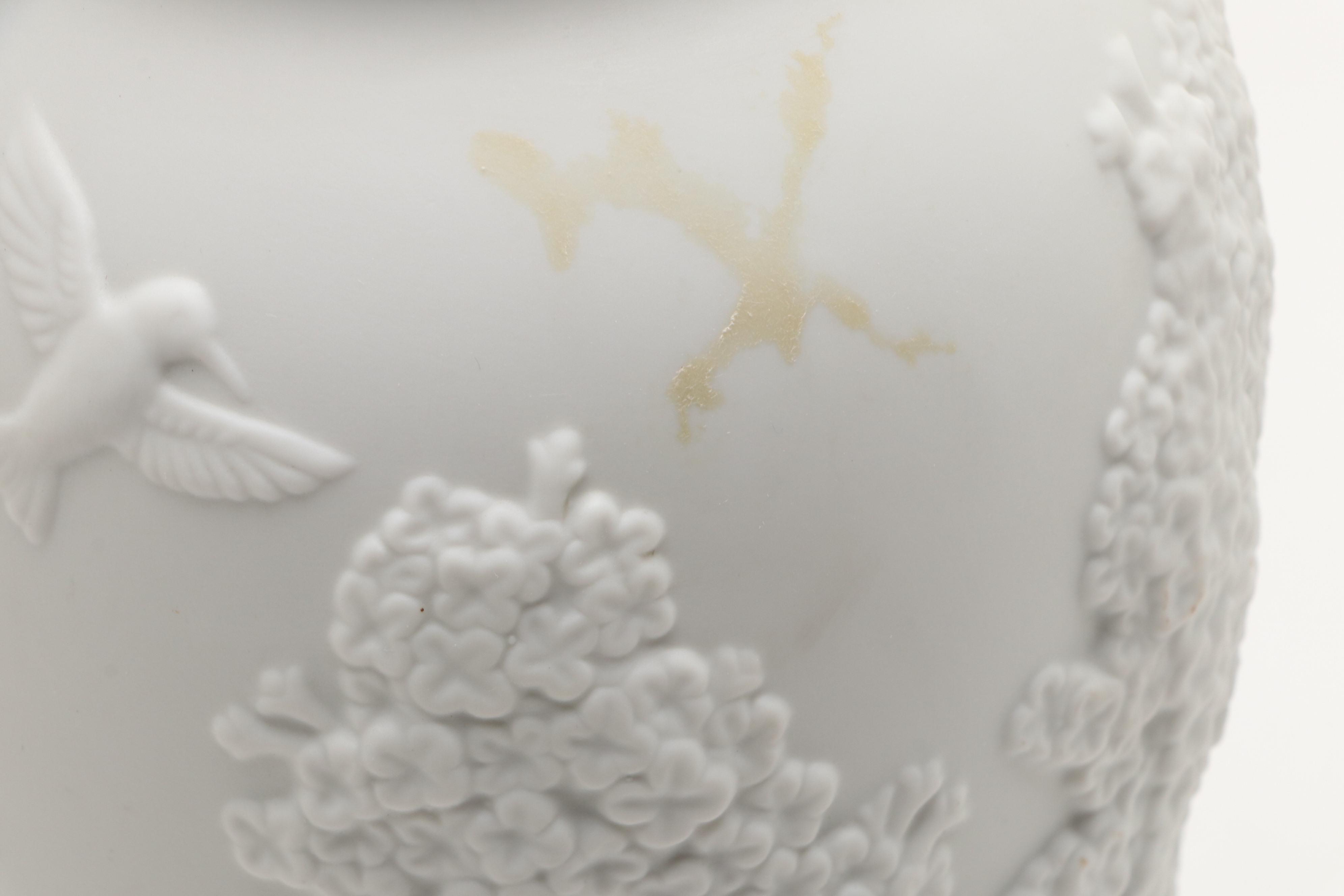 Goebel Cheryl Johnson Vase with "School Boy" and Other Hummel Figurines