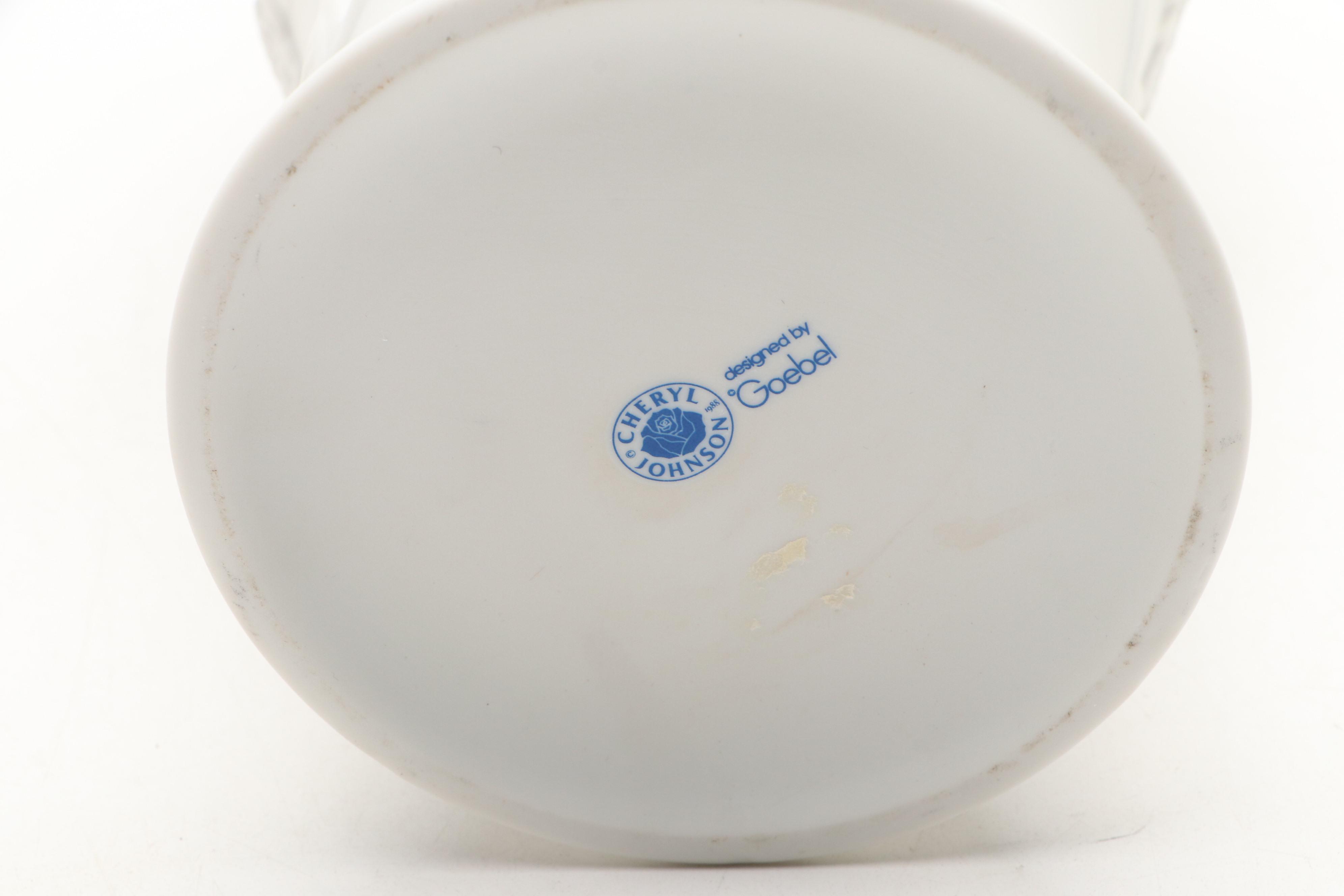 Goebel Cheryl Johnson Vase with "School Boy" and Other Hummel Figurines