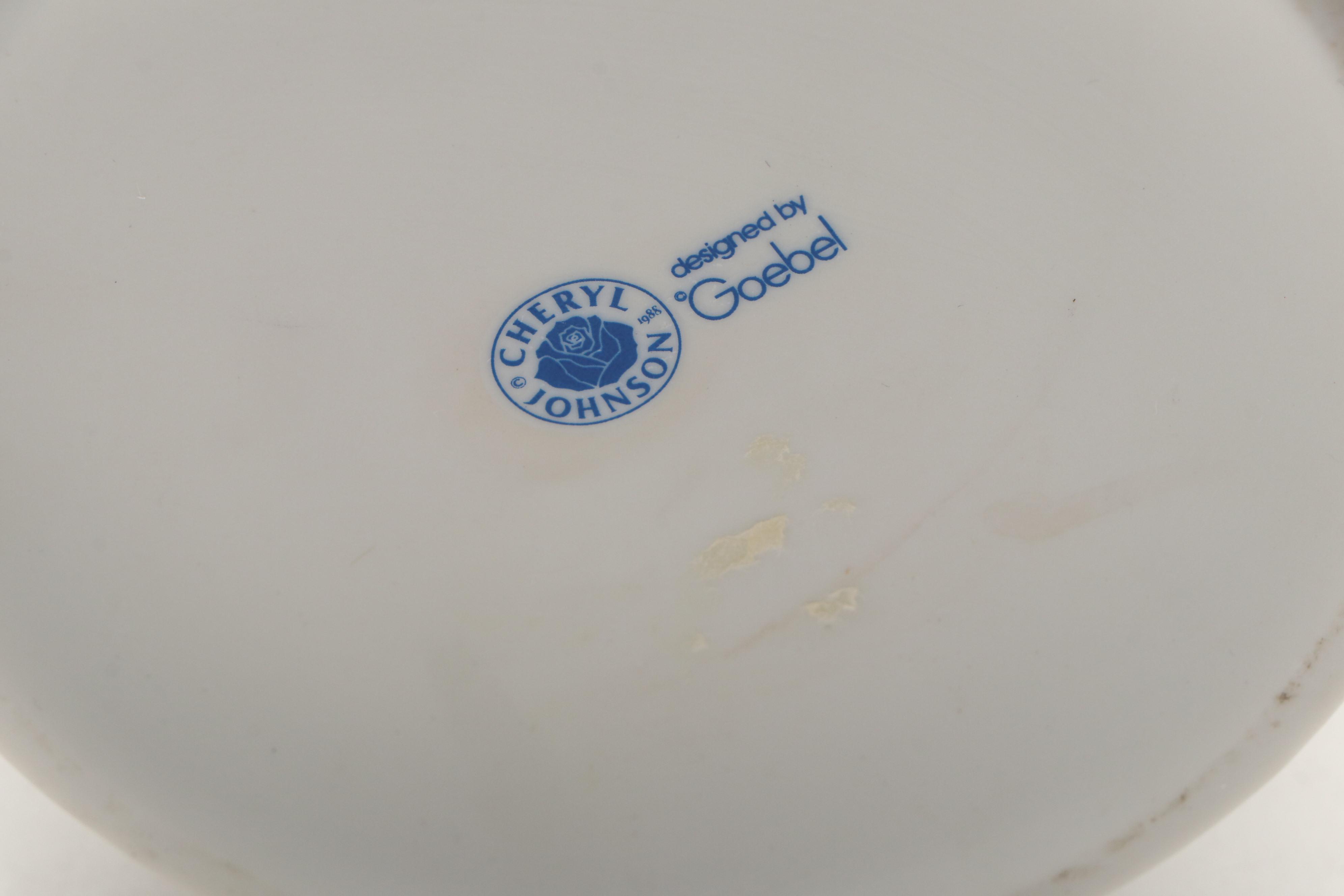 Goebel Cheryl Johnson Vase with "School Boy" and Other Hummel Figurines