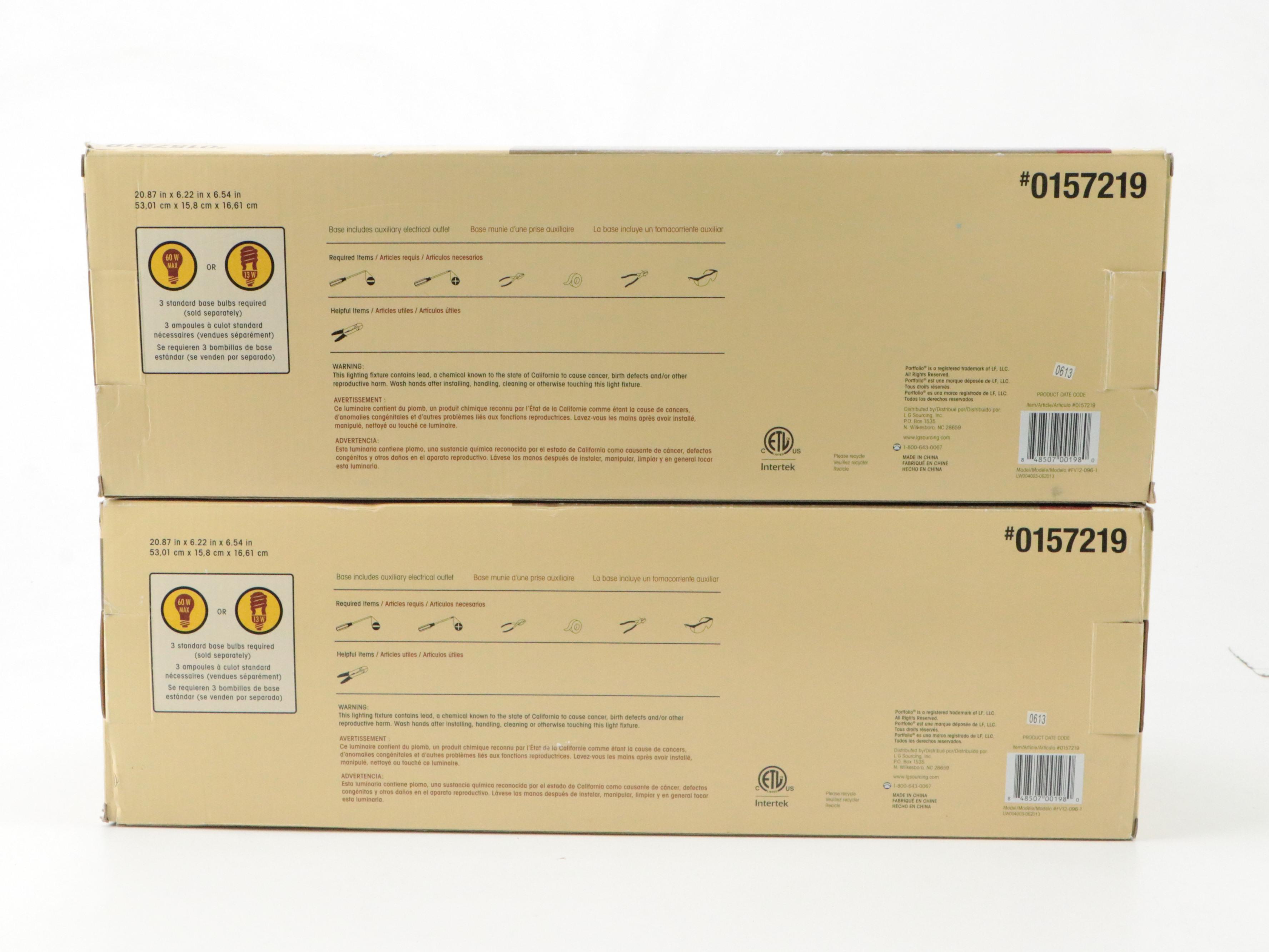 Pair of Portfolio Brushed Nickel Three-Arm Vanity Lights