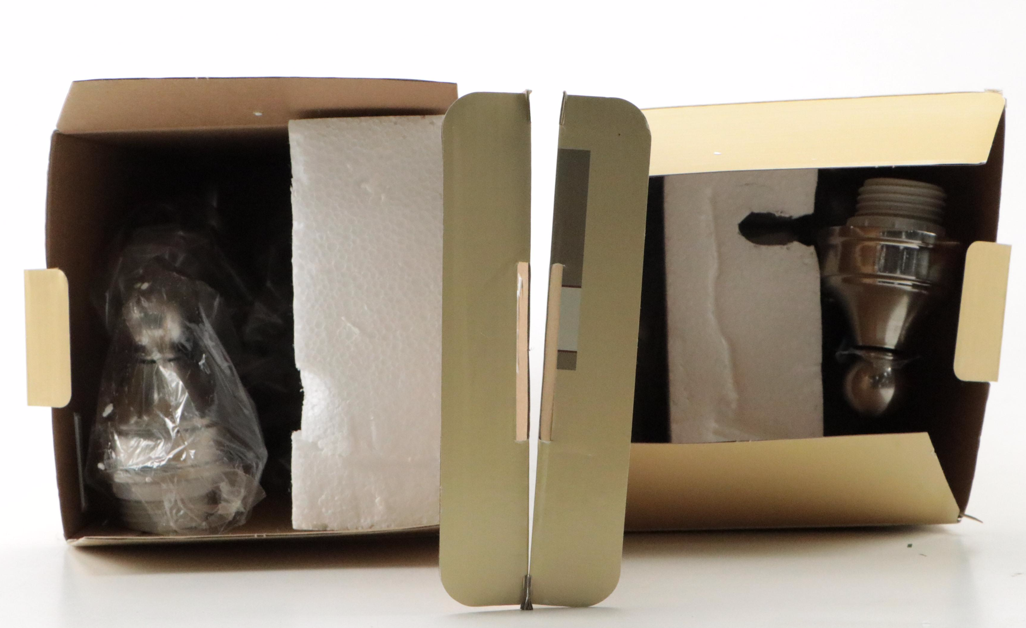 Pair of Portfolio Brushed Nickel Three-Arm Vanity Lights