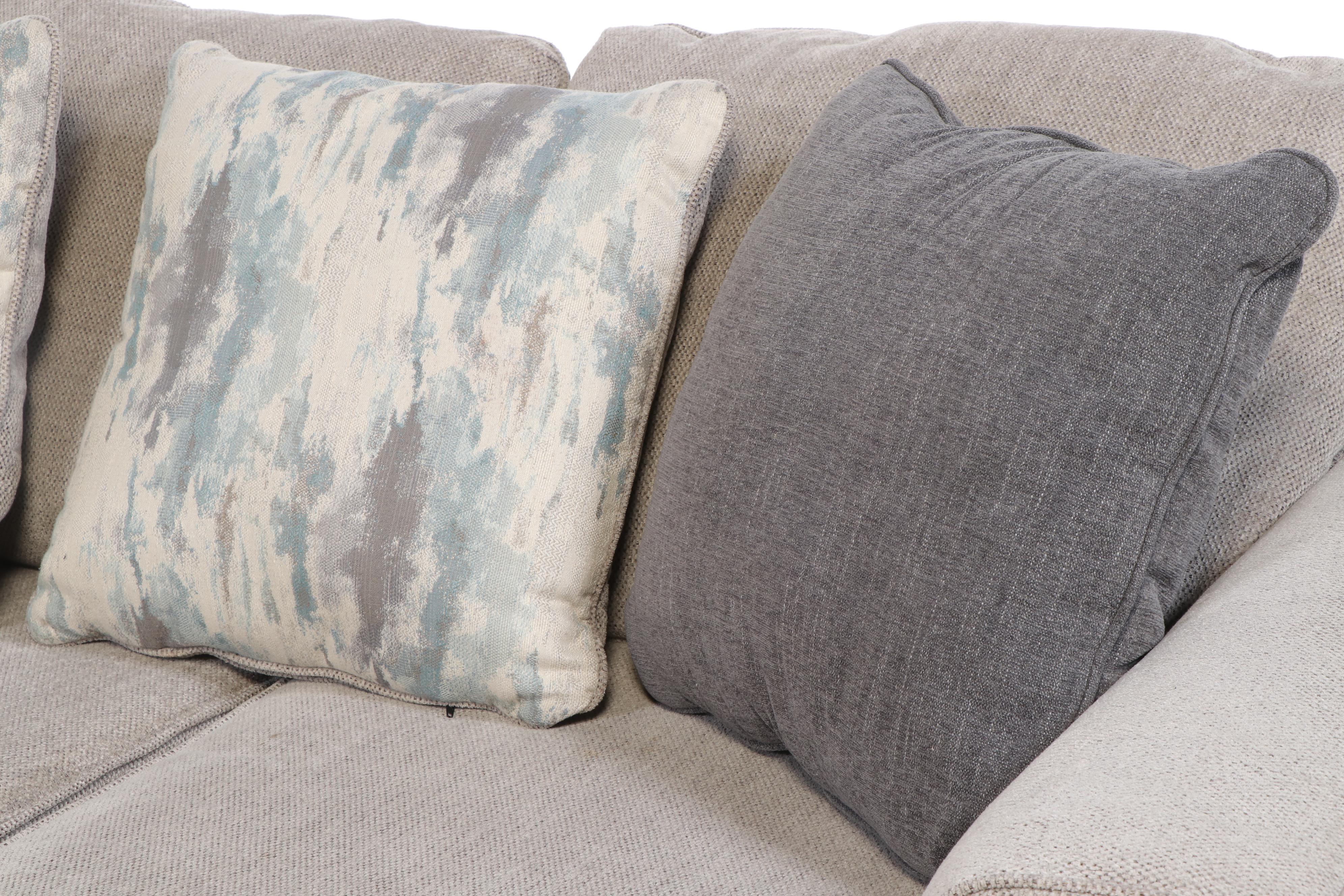 Ashley Furniture Sectional Sofa with Ottoman and Accent Pillows