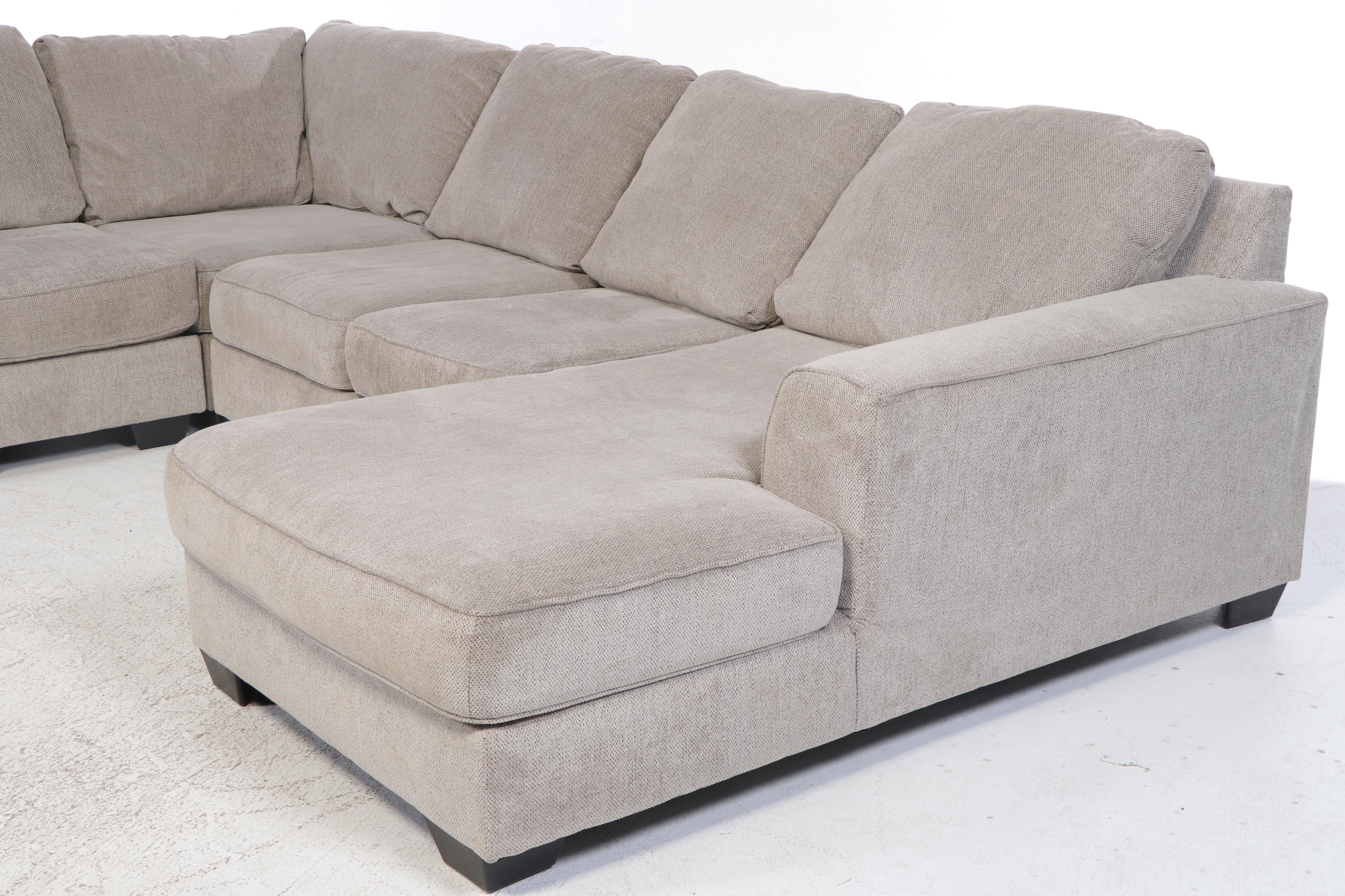 Ashley Furniture Sectional Sofa with Ottoman and Accent Pillows